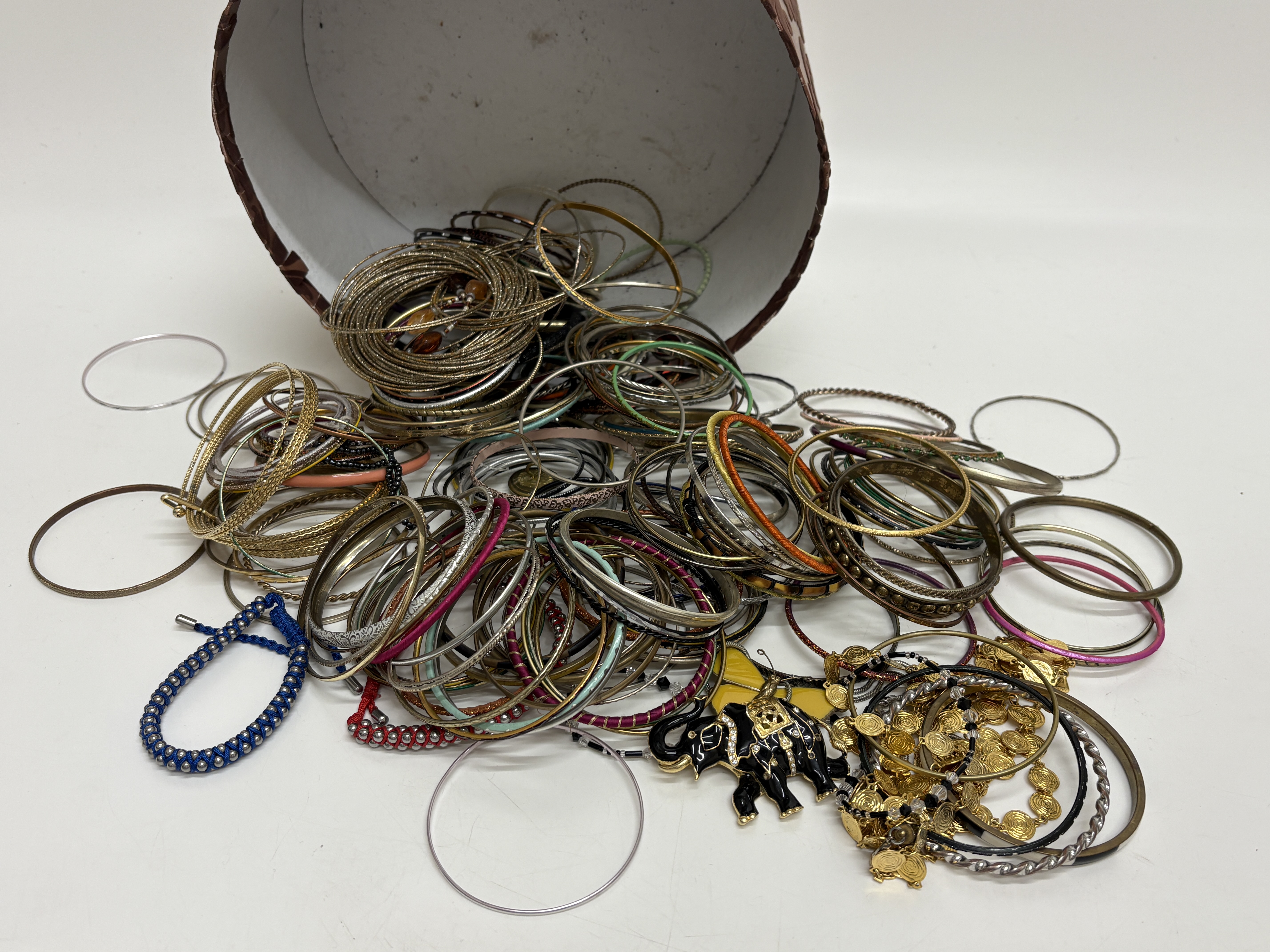 A Collection of Mixed Costume Jewellery Bangles and an Elephant Brooch