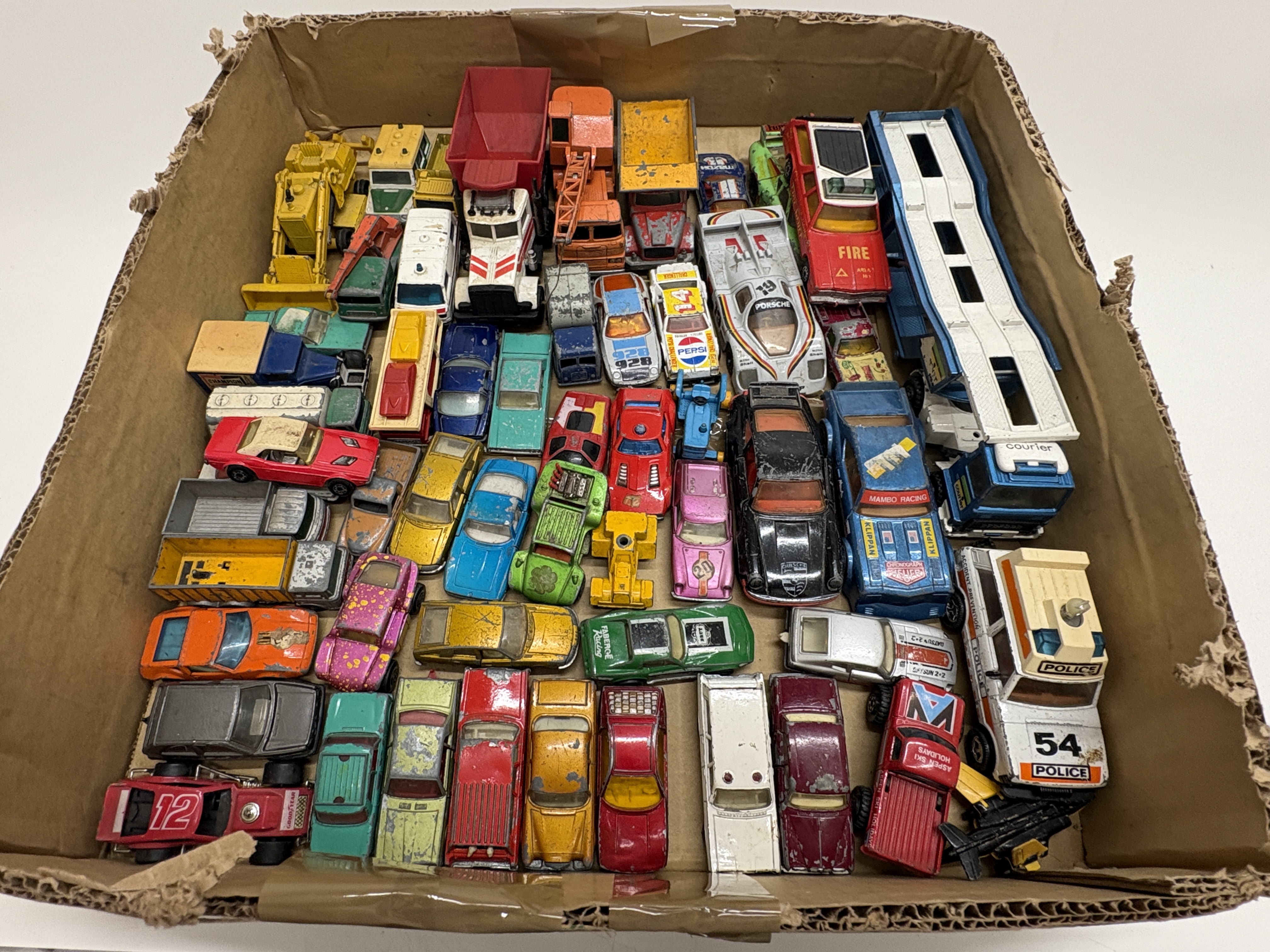 A Collection of Approximately 50 Vintage Toy Vehicles including Matchbox, Corgi Juniors, and Majorette