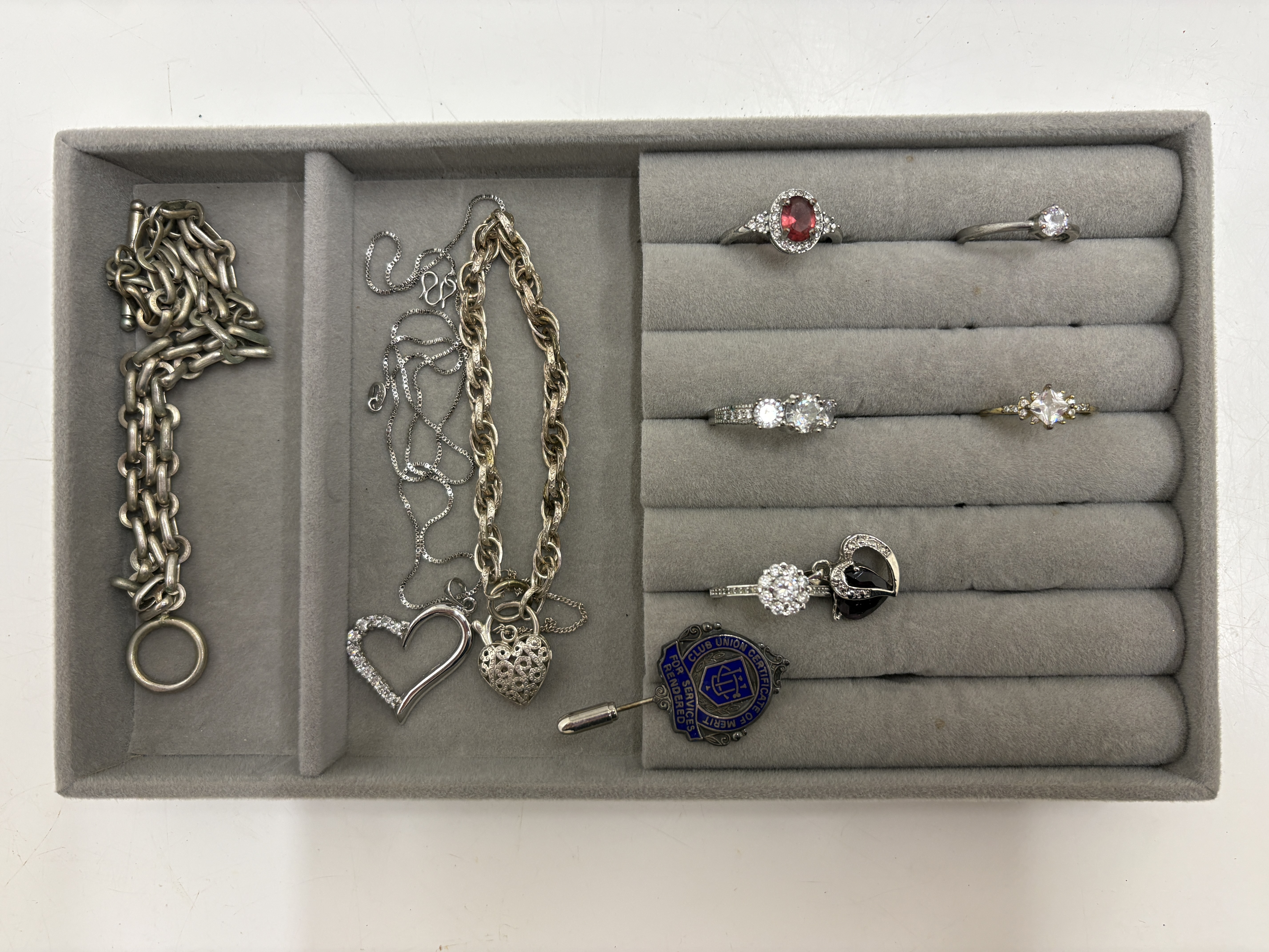 An Assortment of Silver Jewellery and a silver Club Union Commemorative Pin Gross weight circs 52.8