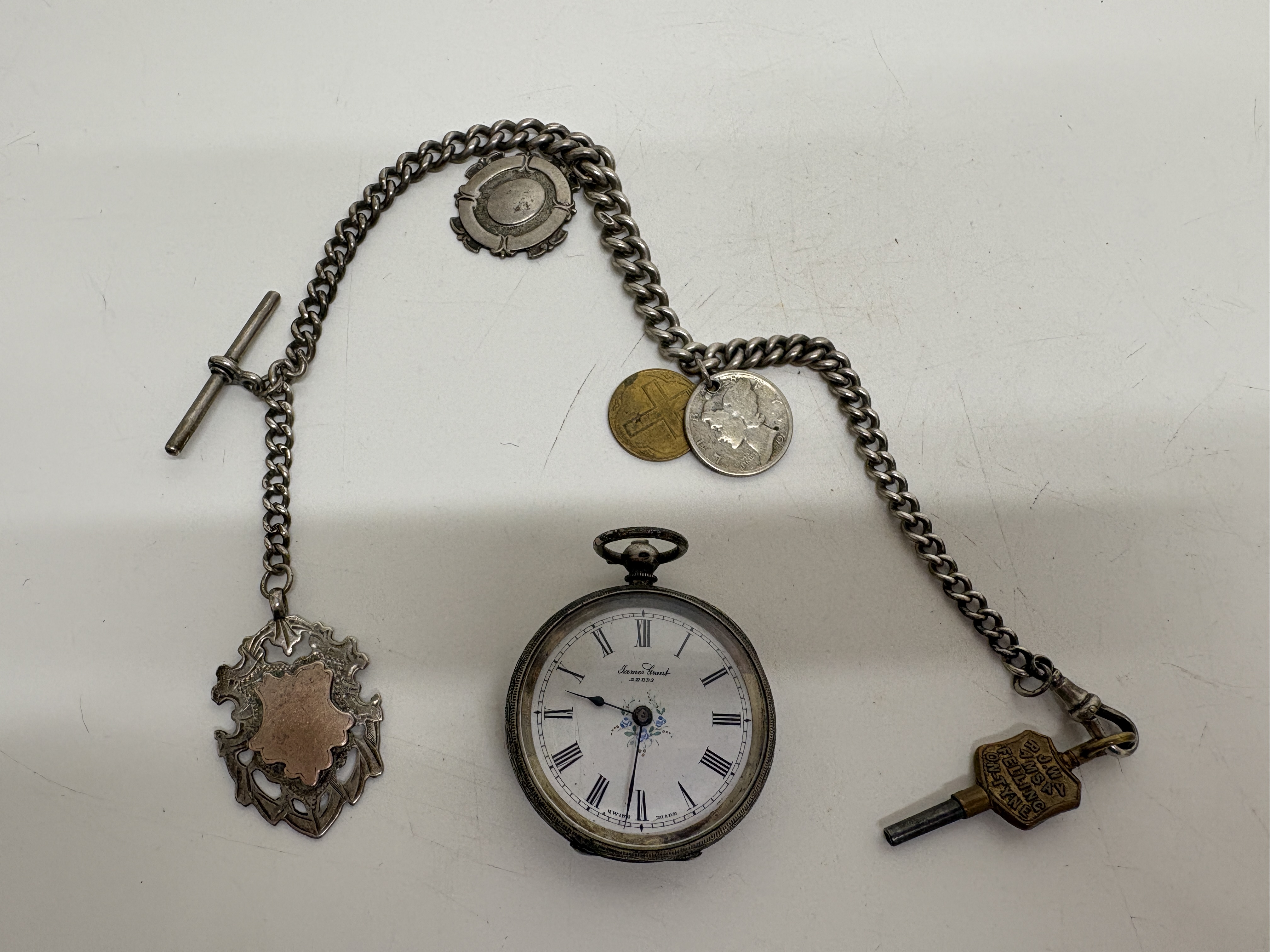 A Silver Pocket Watch and Albert Chain with Fobs Chaiun & Fobs 34.1g Gross total weight 78g with pocket watch