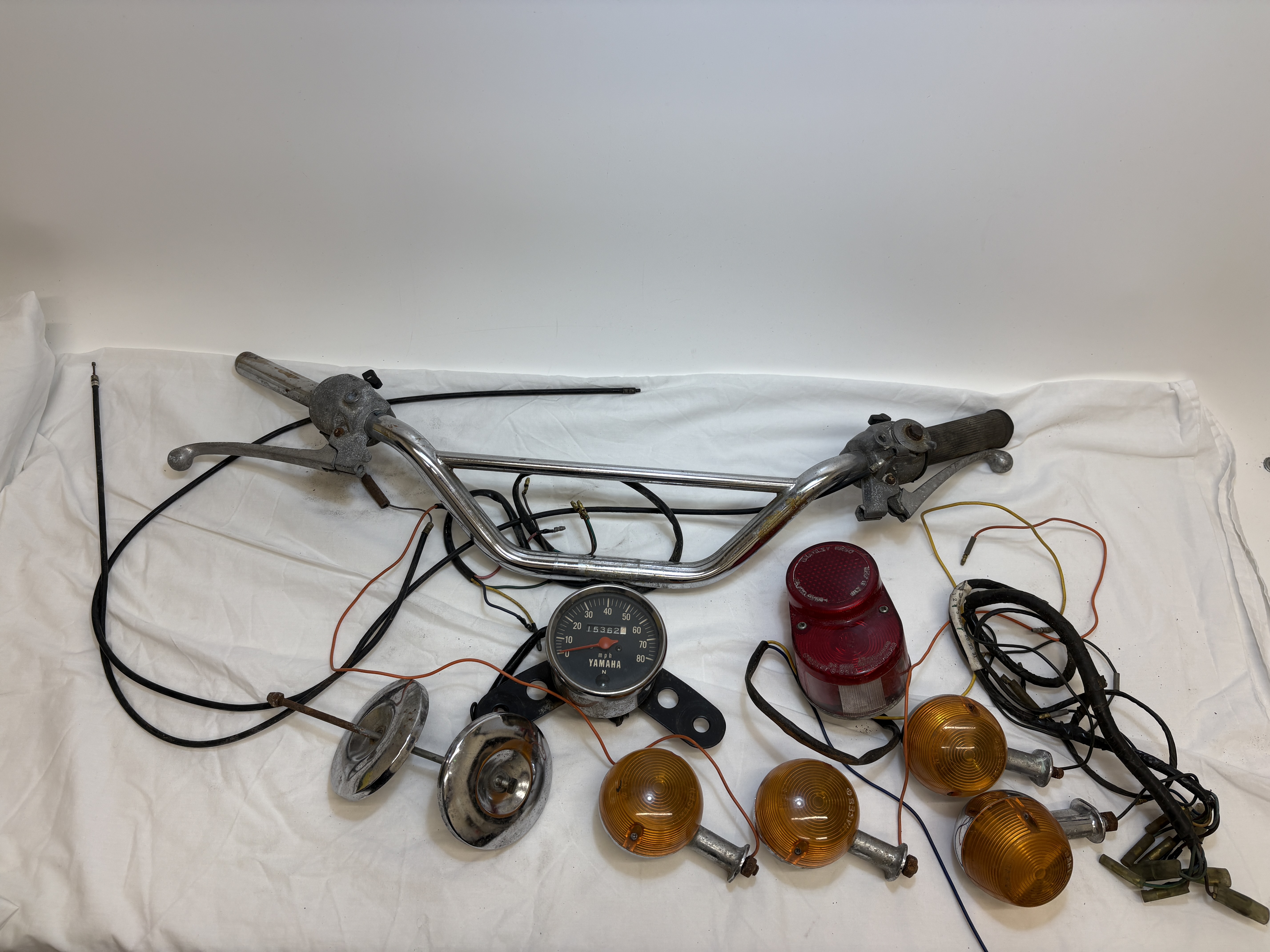 A Collection of Vintage Yamaha FS1E Motorcycle Components including Speedometer and Lighting 1974/75 (N Plate)