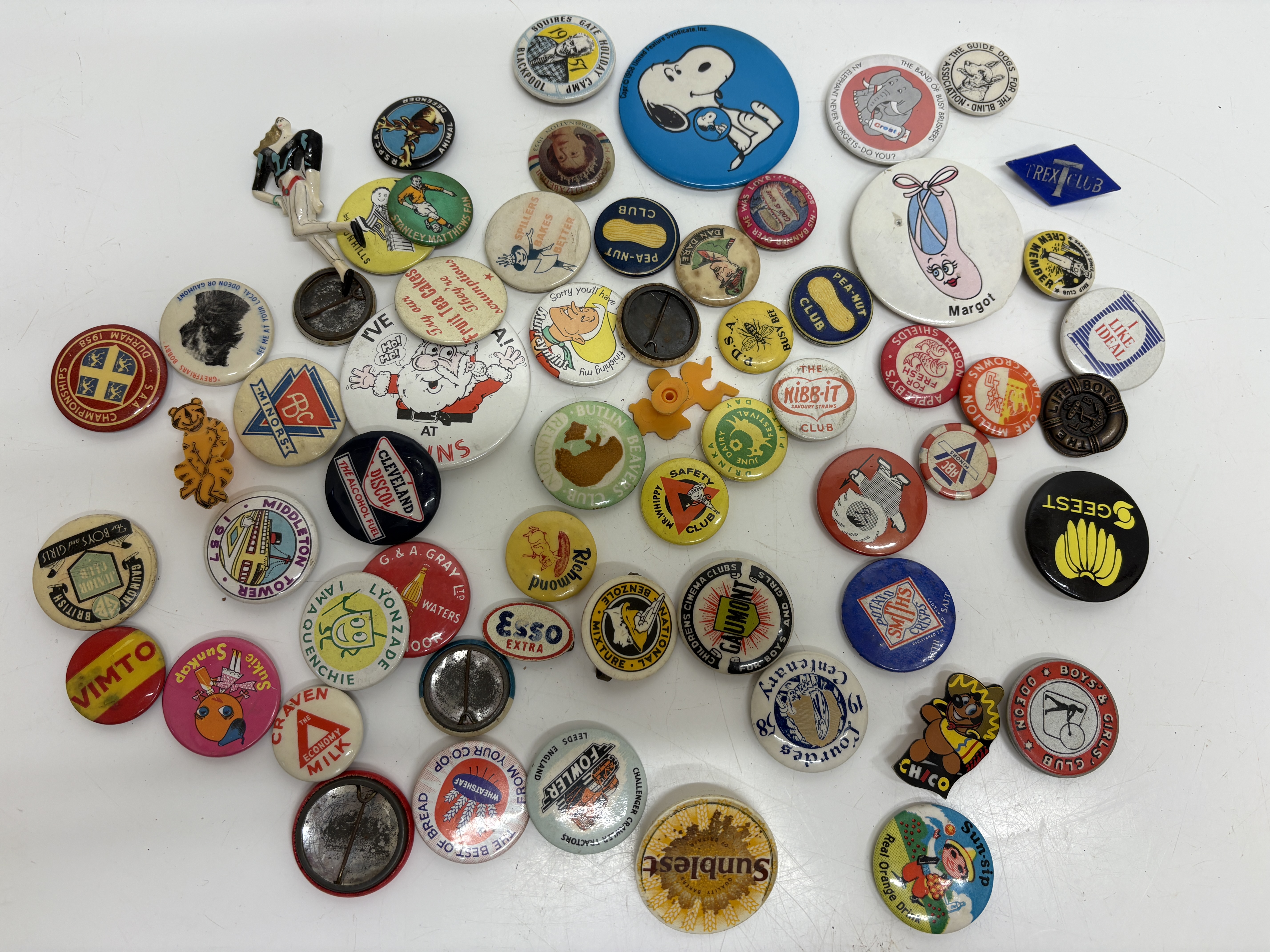 A Collection of Mid-20th Century Vintage Pinback Buttons and Advertising Badges