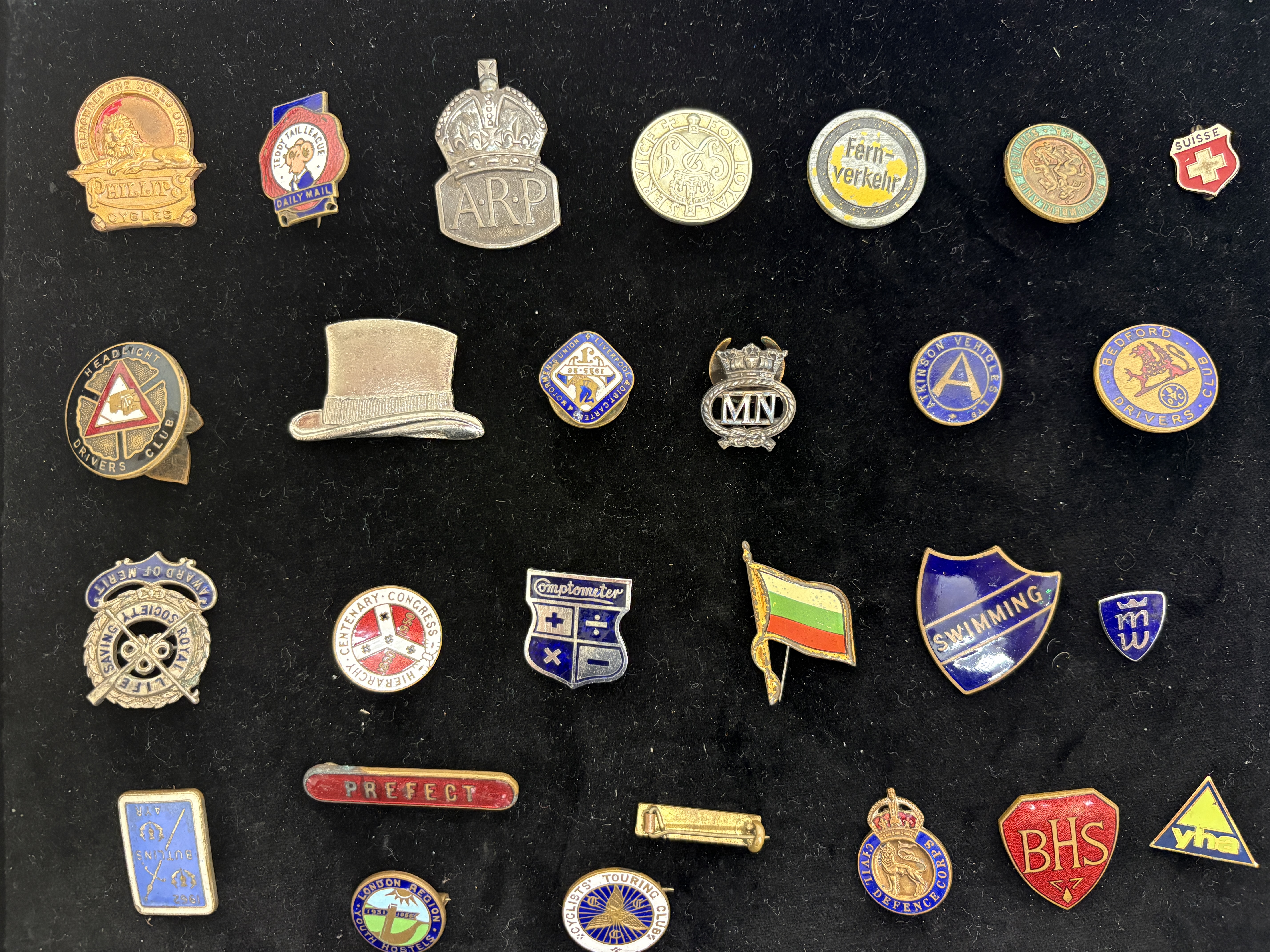 A Collection of Vintage British and Continental Enamel and Metal Lapel Badges