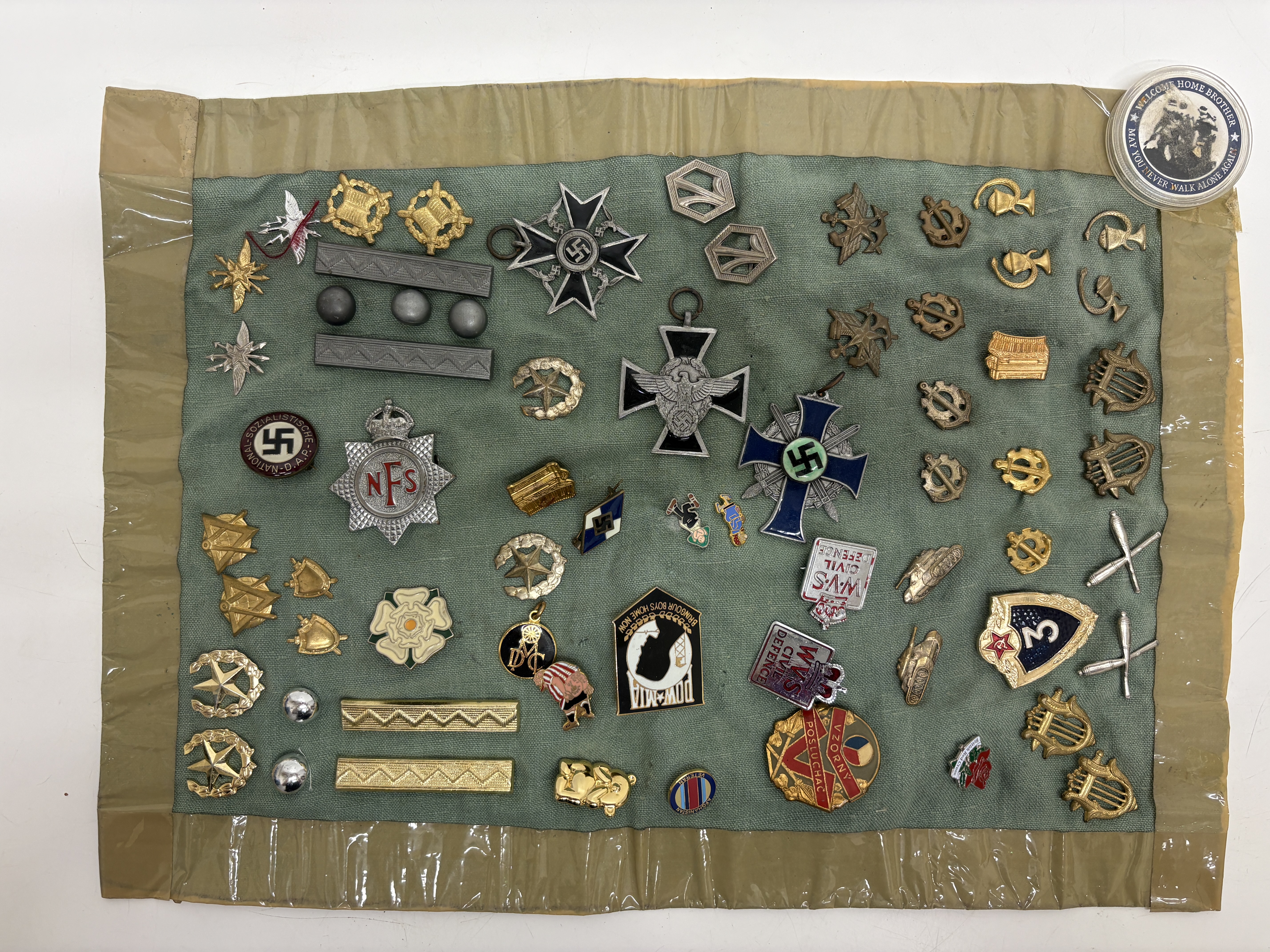A Collection of 20th Century British, German and International Military and Civilian Badges, Medals and Commemorative Insignia