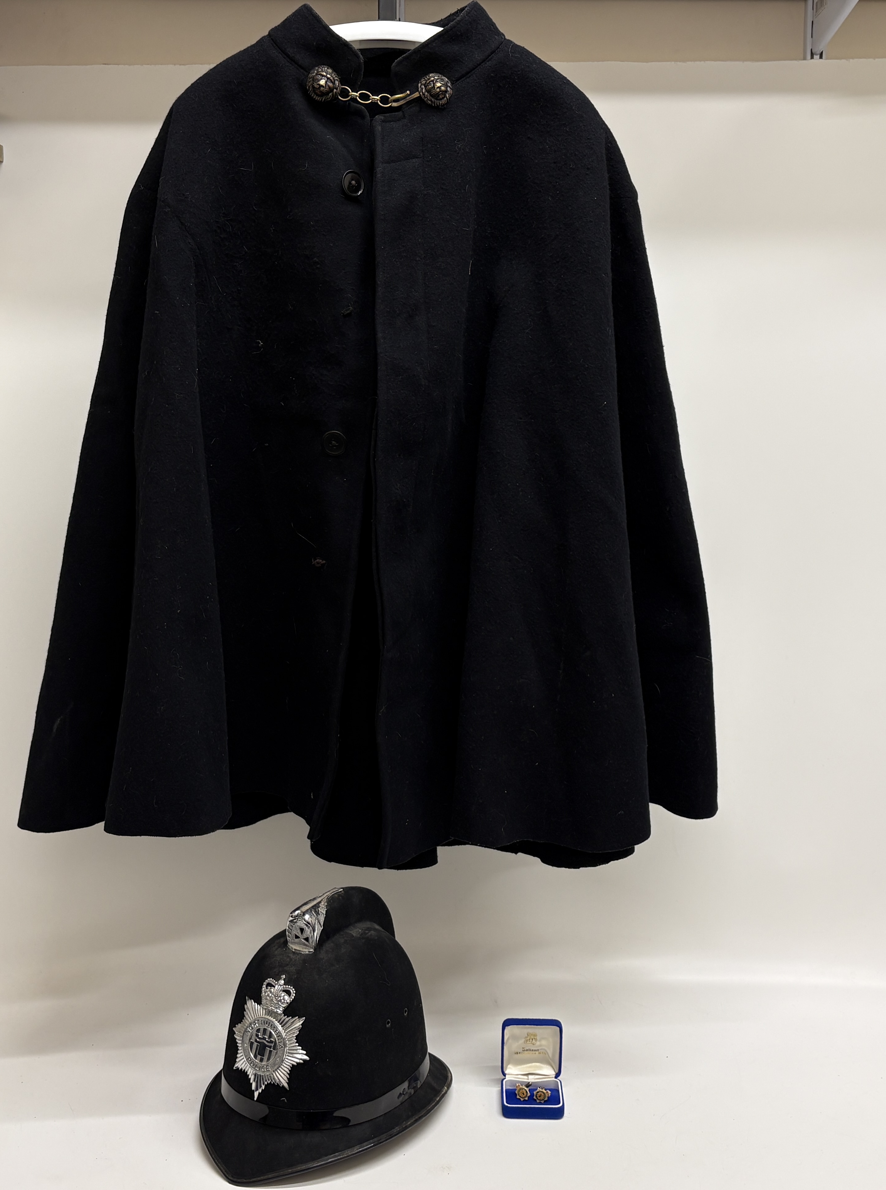 A Northumbria Police Uniform Grouping Including A Christys And Gaunt Custodian Helmet And Duty Cape