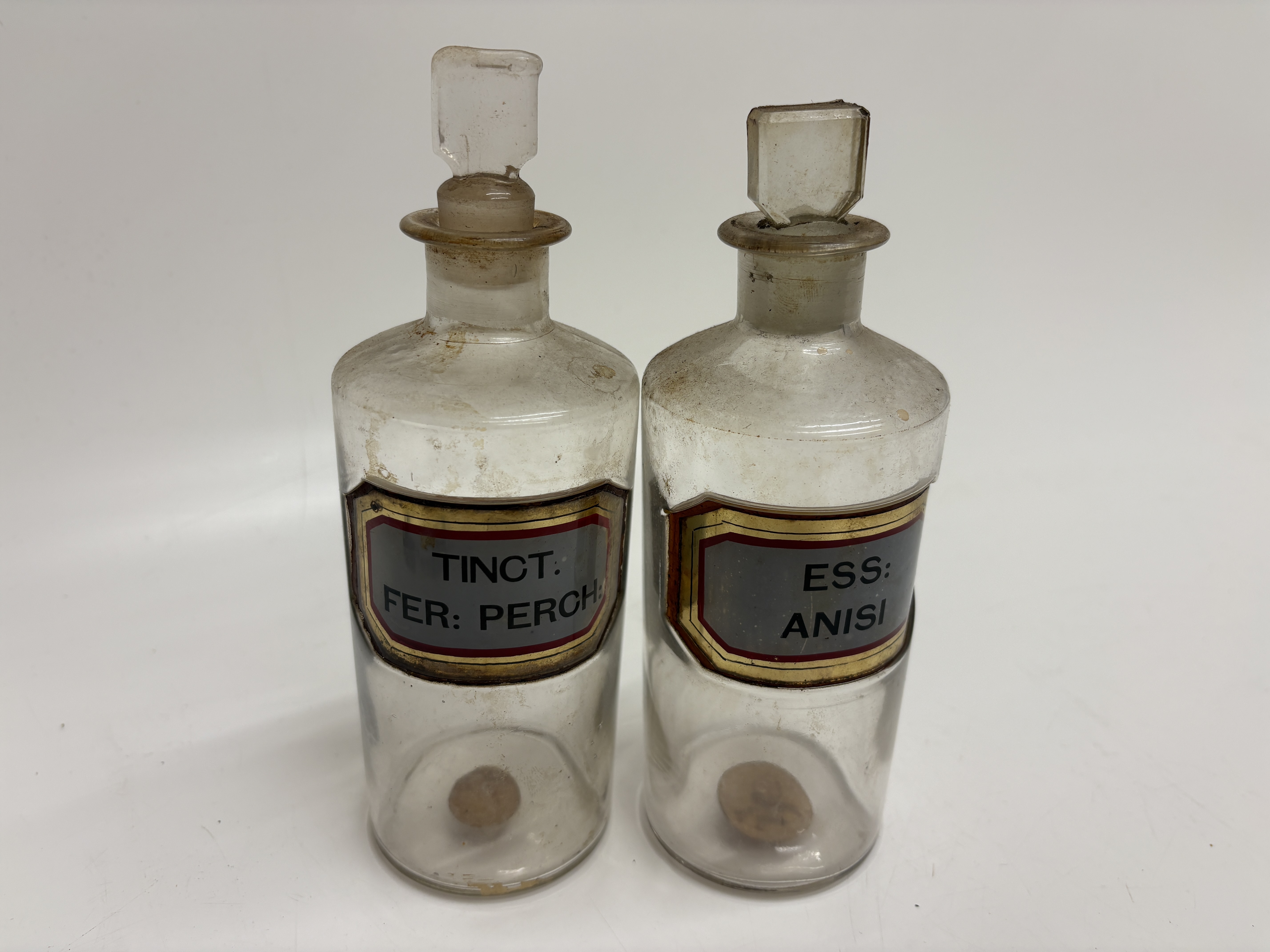 A Set of two Victorian Clear Glass Apothecary Bottles 17cm