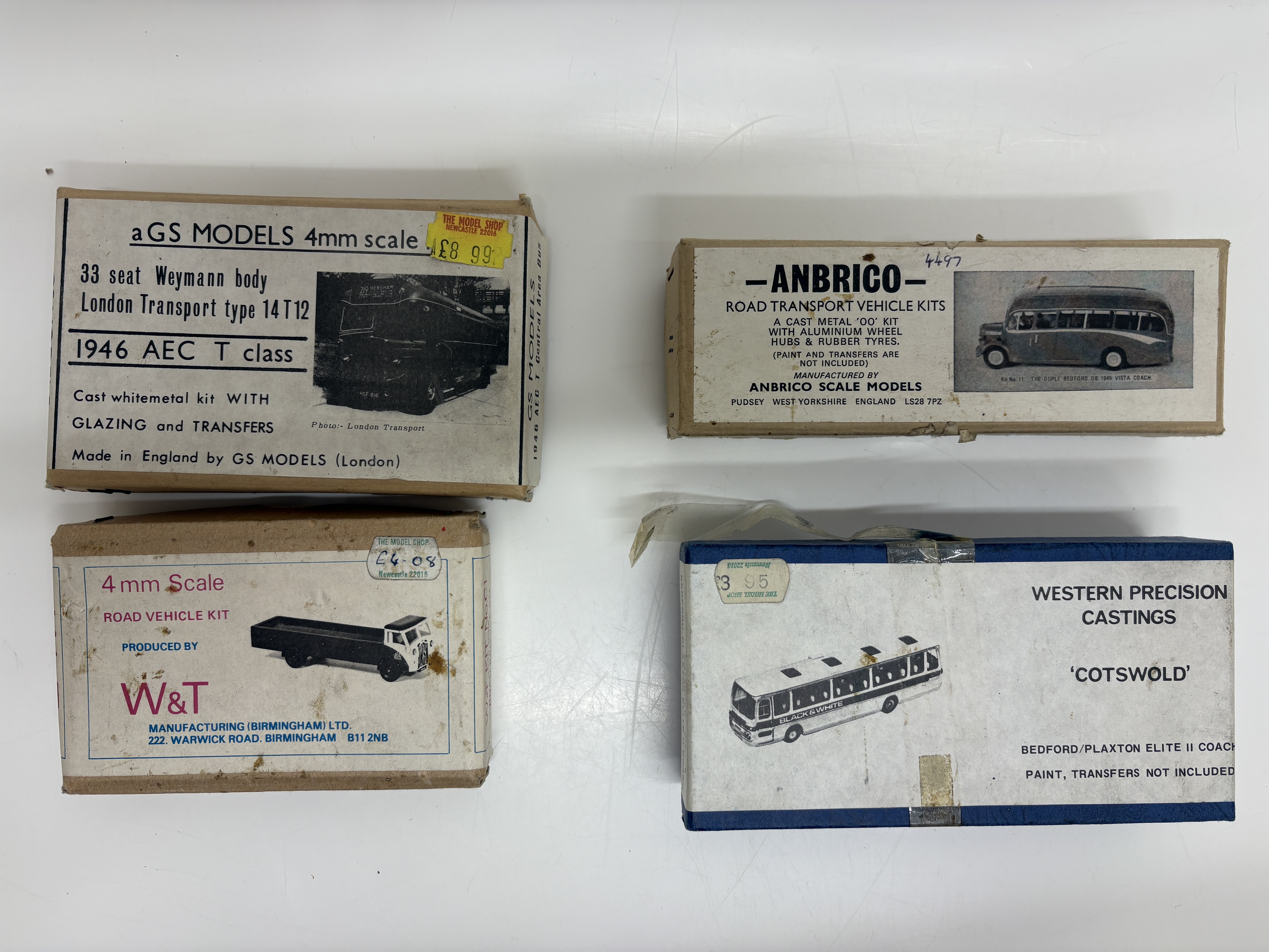 A collection of vintage 4mm scale whitemetal and cast metal bus and truck model kits by Anbrico, GS Models, W&T and Western Precision Castings