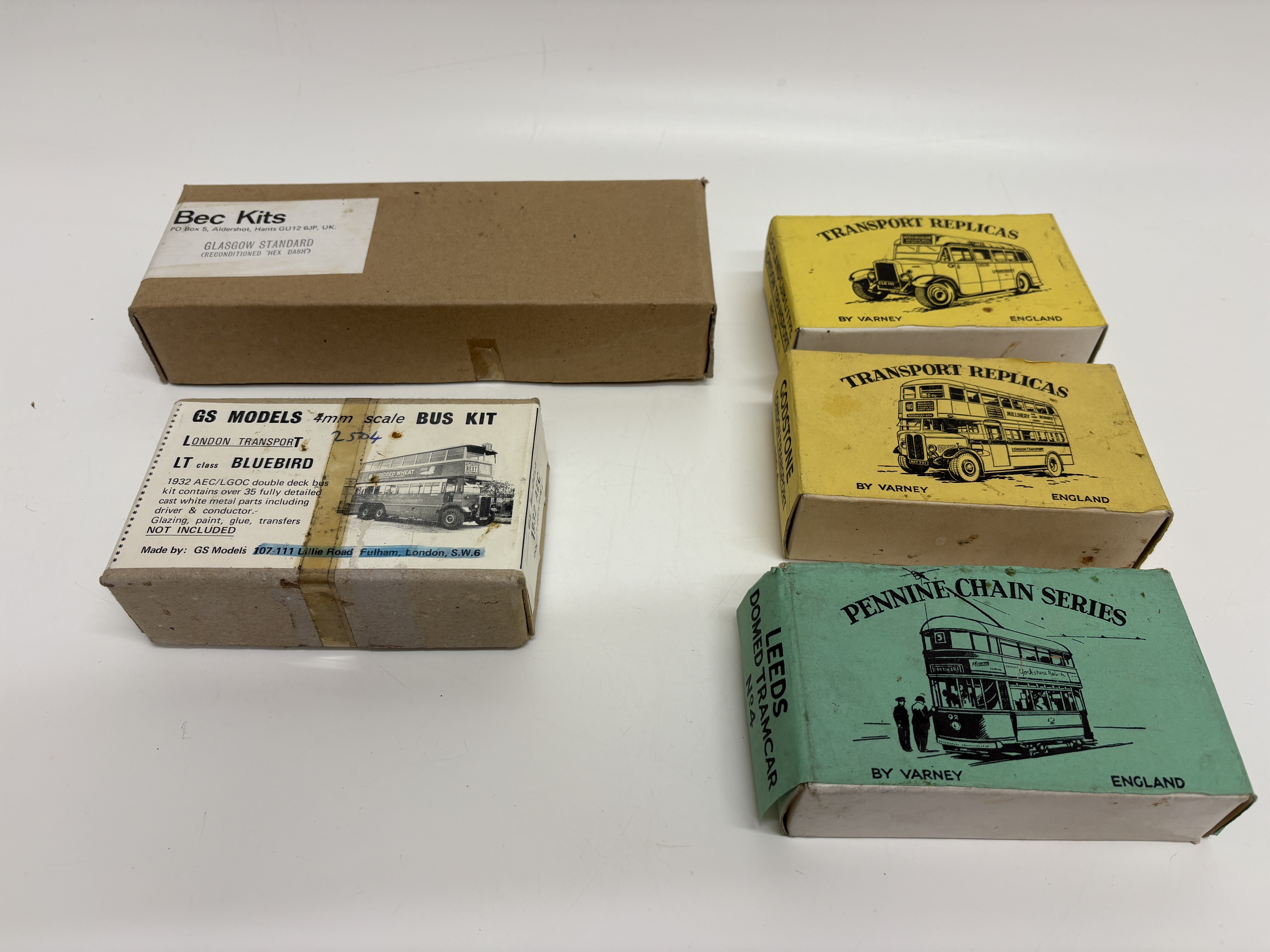 A Collection of Vintage 4mm Scale White Metal Bus and Tram Model Kits