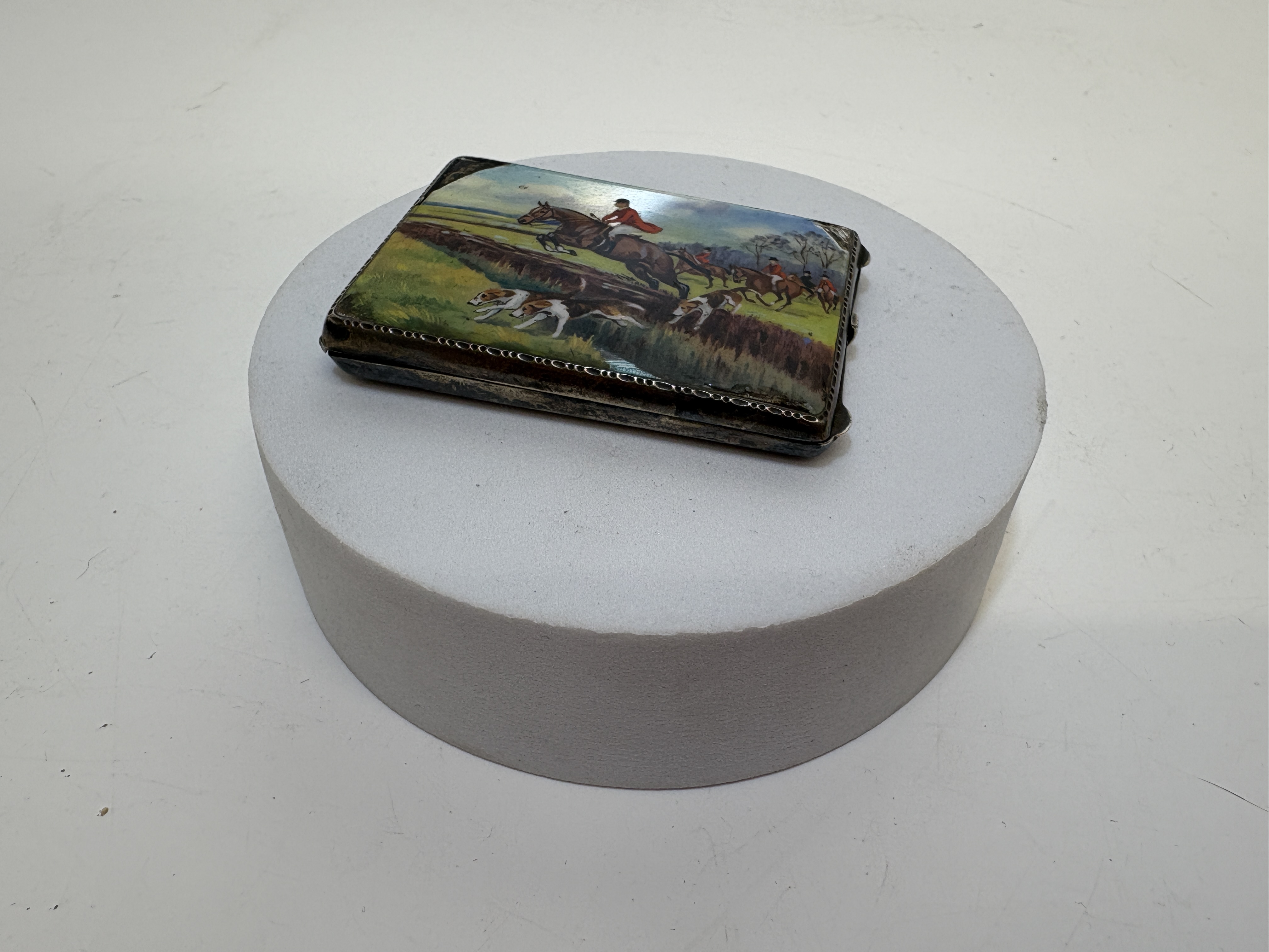 A sterling silver and guilloché enamel fox hunt cigarette case gross circa 38g