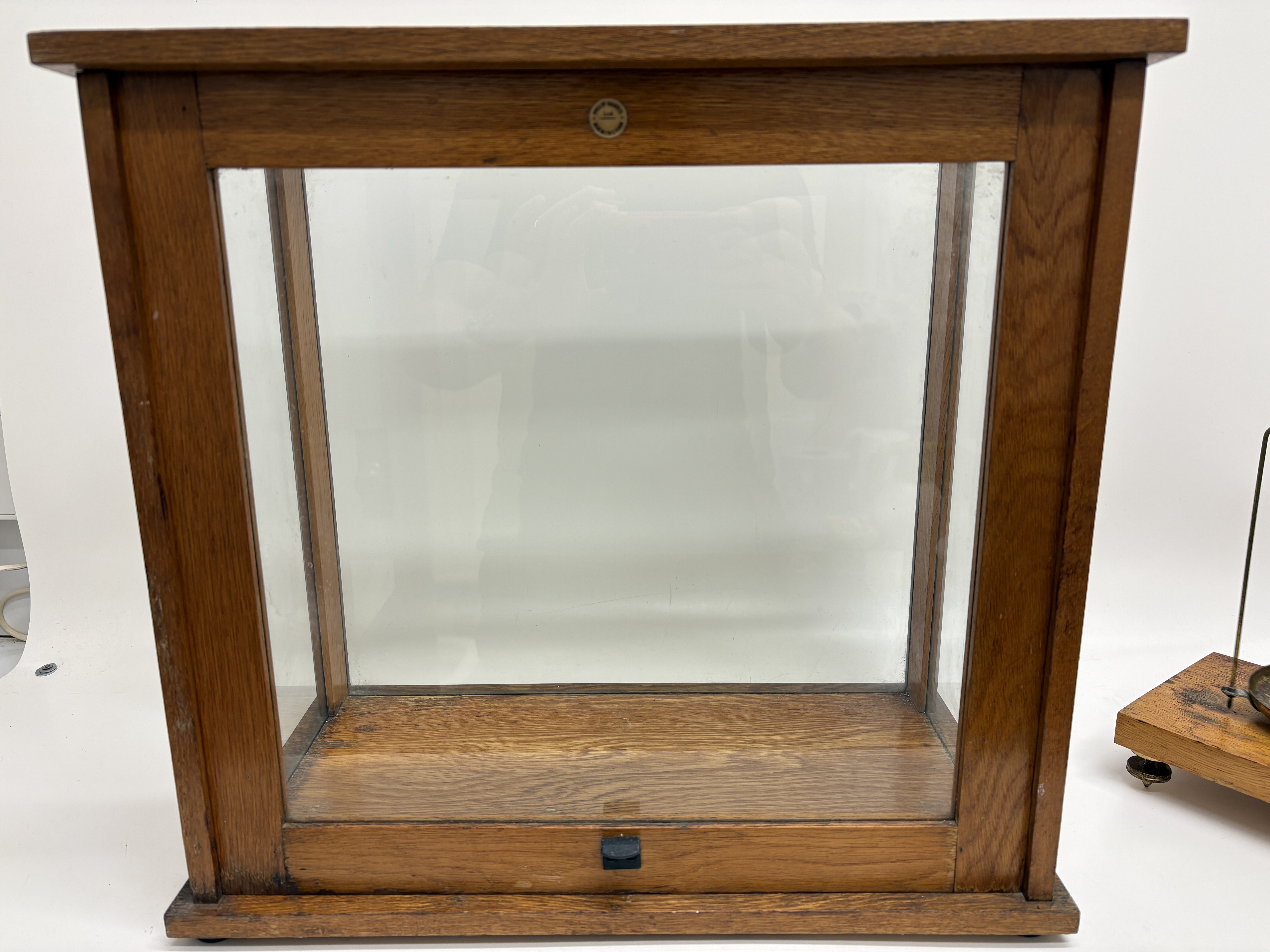 A Philip Harris Ltd Oak and Glass Cased Analytical Balance Scale