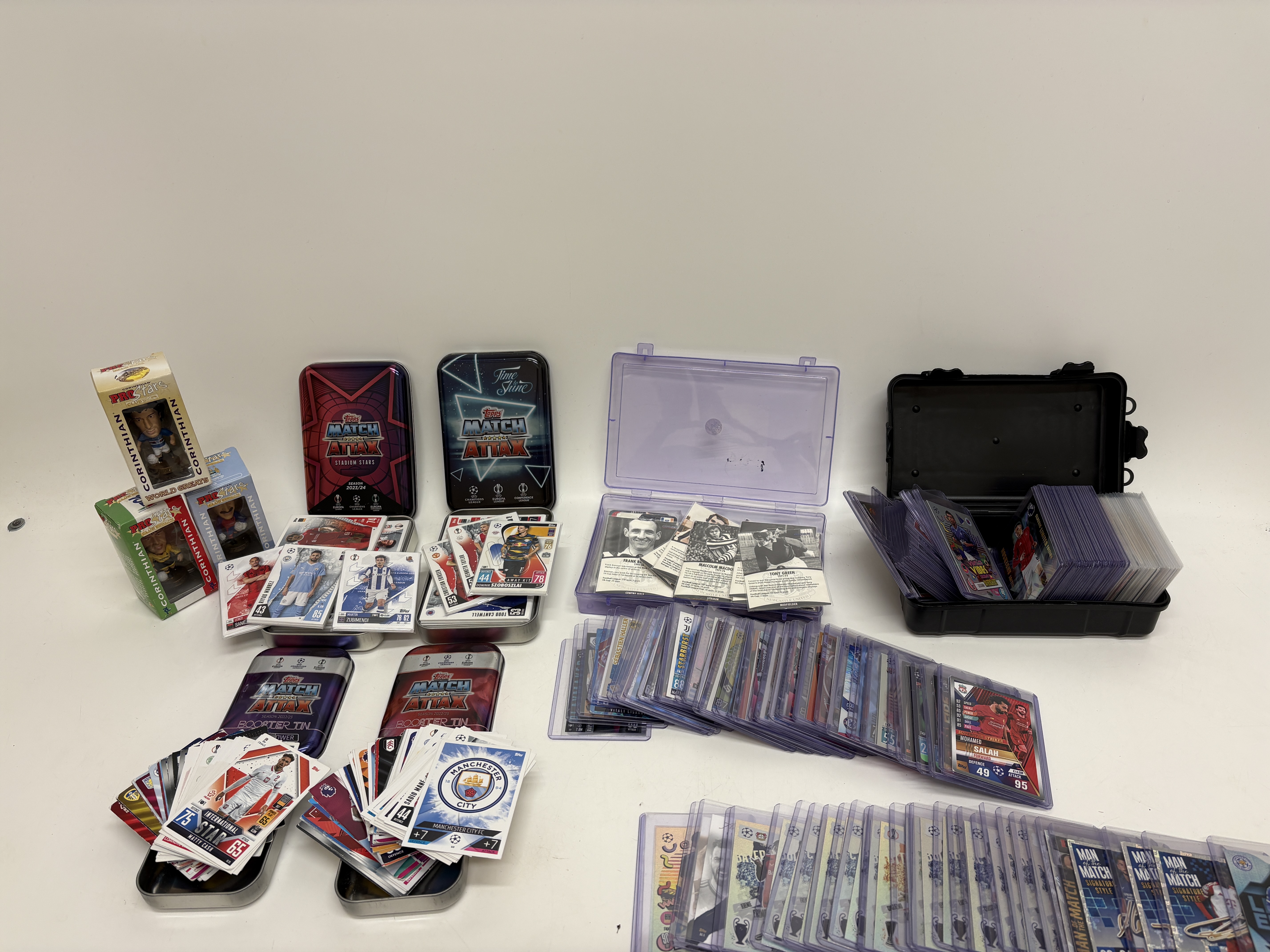 A Collection of Topps Match Attax and Panini Football Trading Cards and Corinthian ProStars Figurines