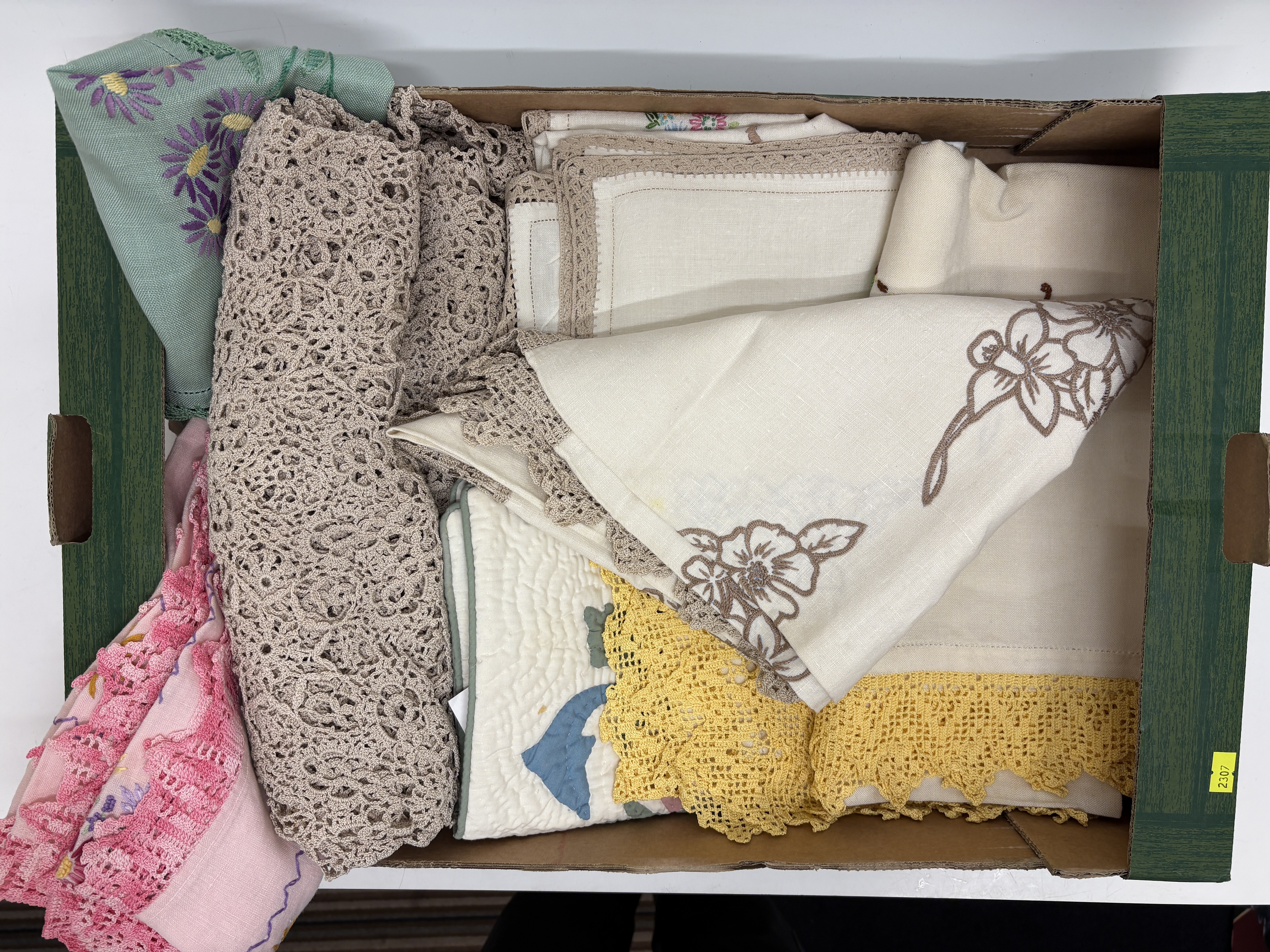 An Assortment of Vintage Embroidered and Crochet Trimmed Domestic Linens