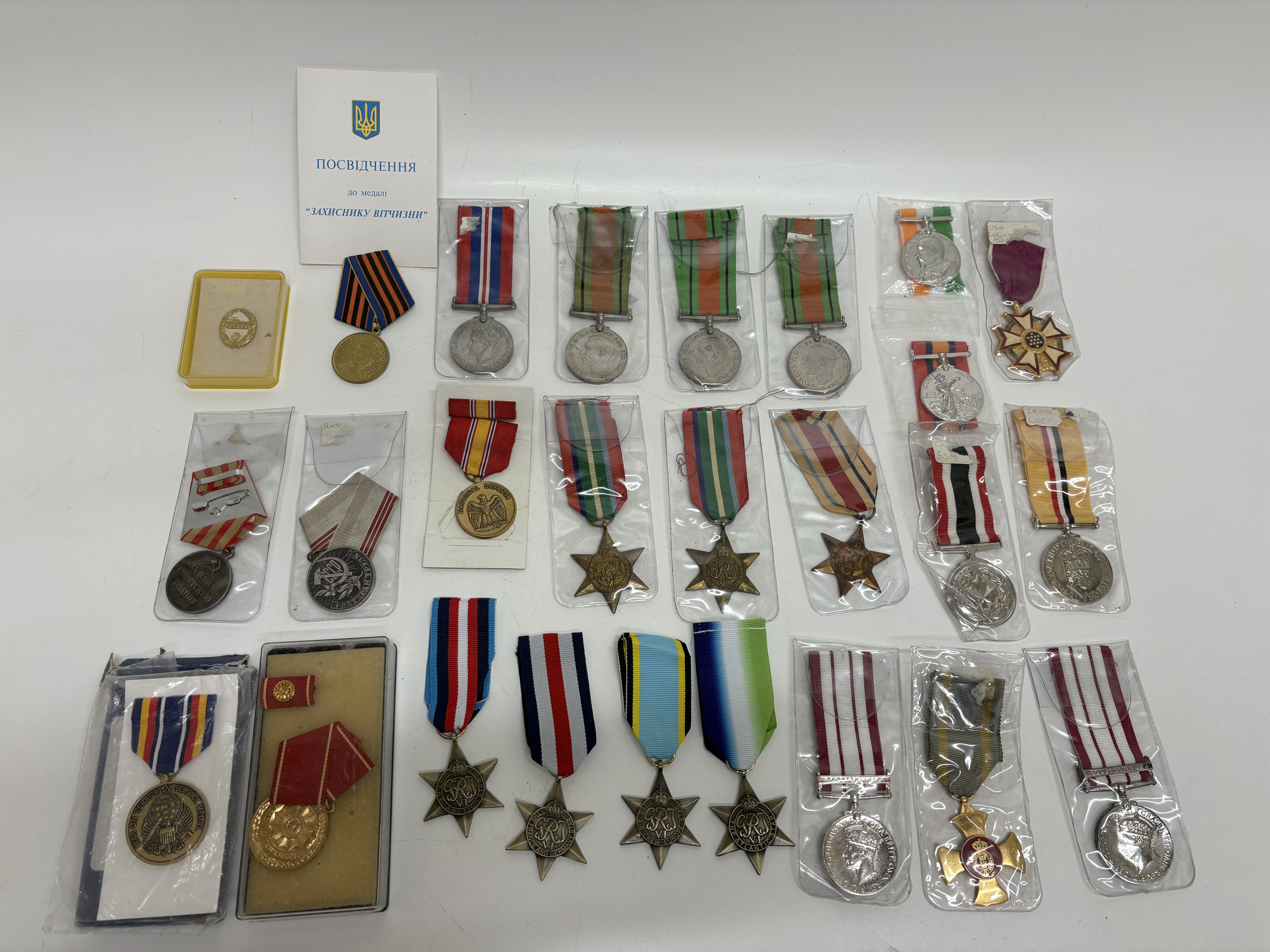 An Assortment of British and International replica Military Medals and Awards