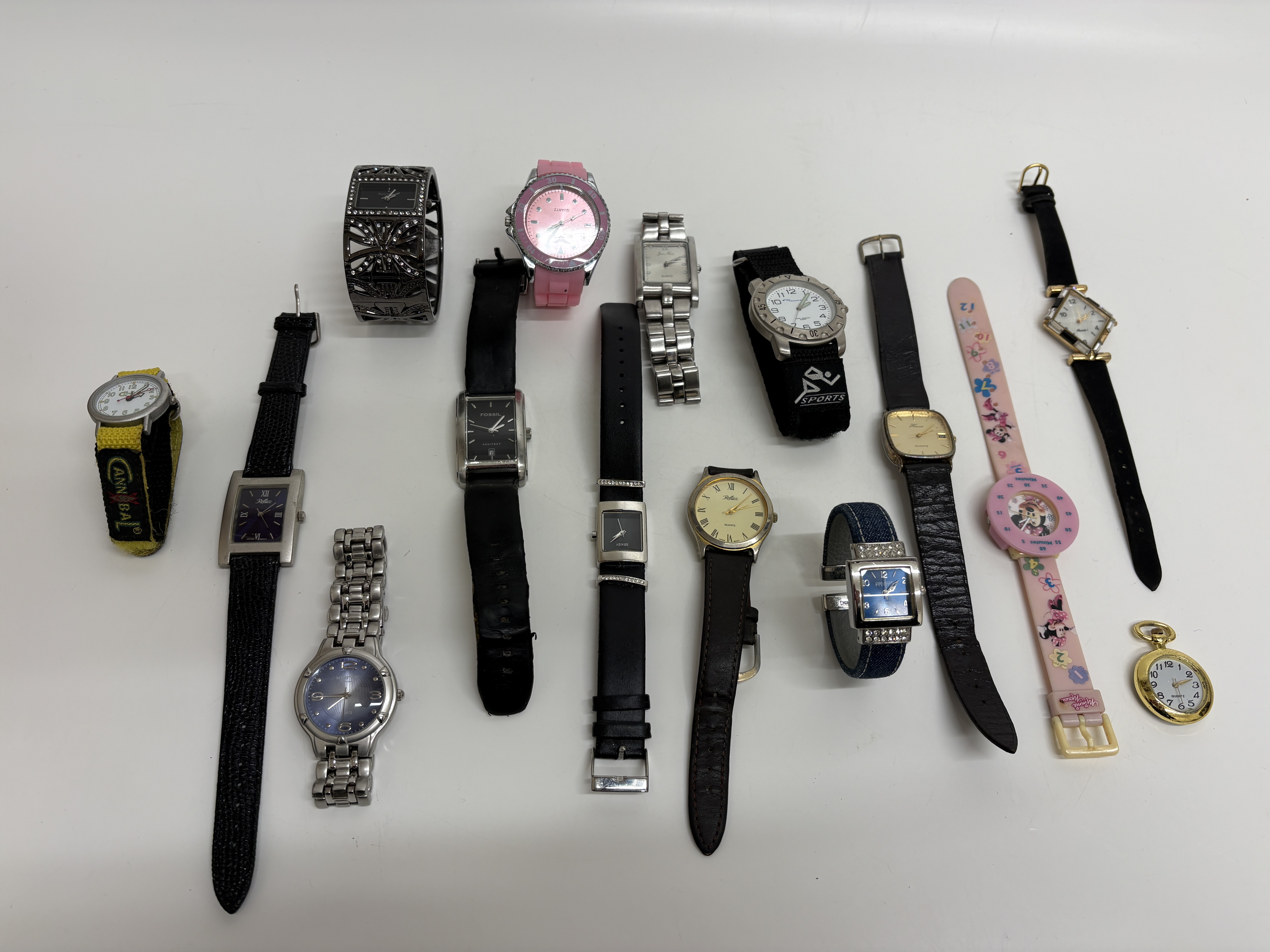 An Assortment of Working  Wristwatches and a Pocket Watch including Fossil, Seksy, and Reflex