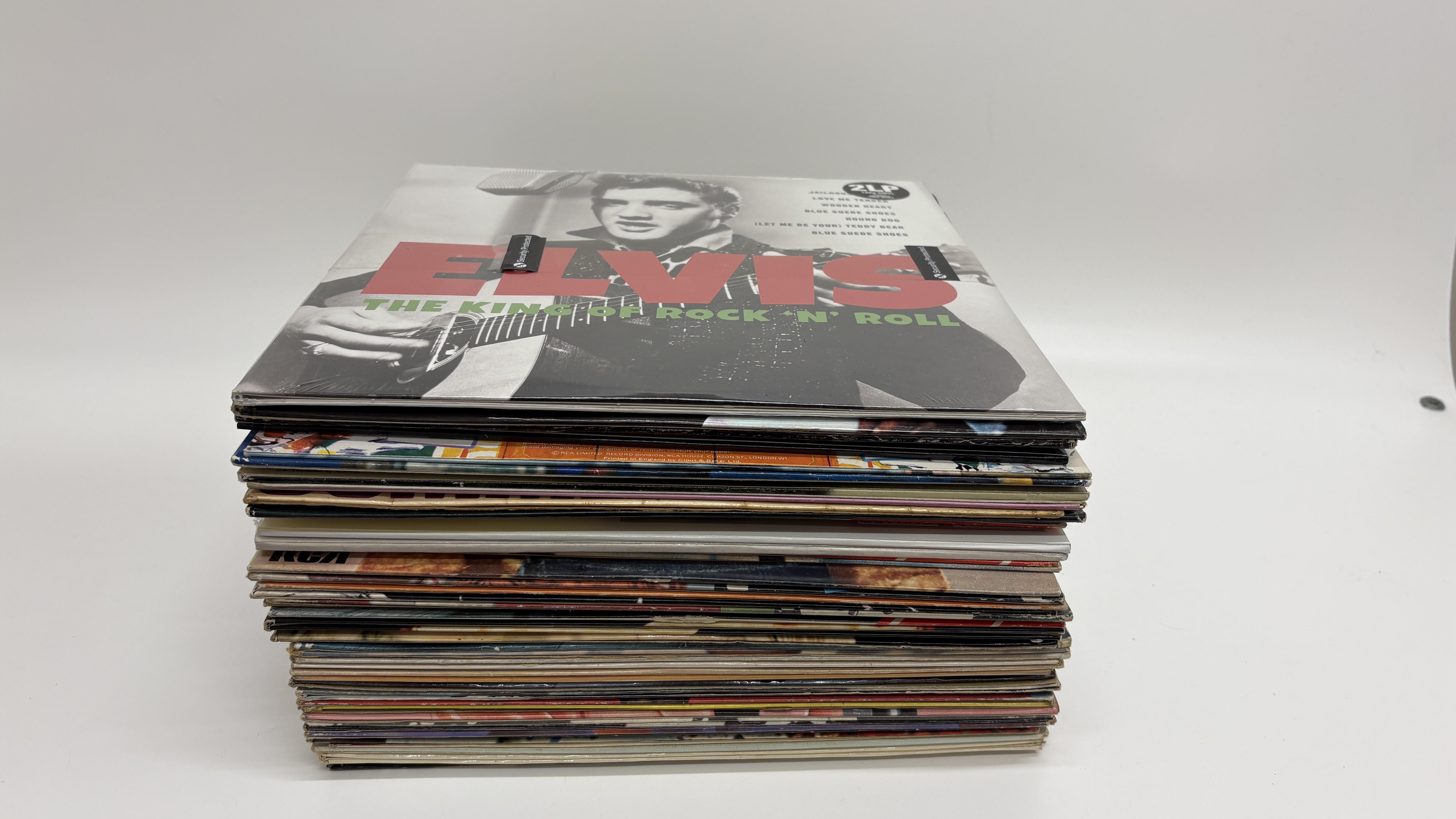 An assortment of approximately 40 Elvis Presley vinyl LPs and compilation sets