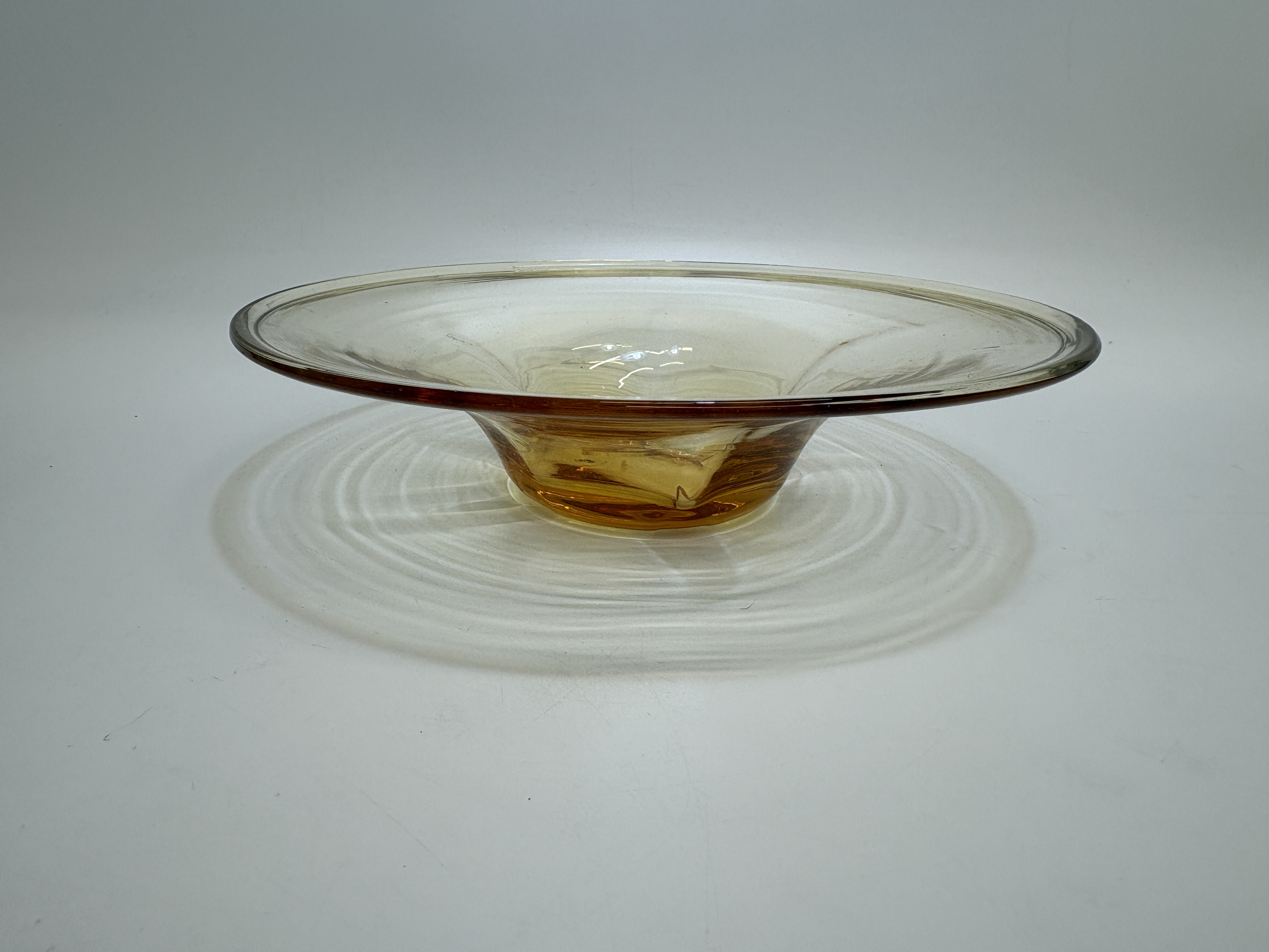 A mid-century amber art glass centrepiece bowl 28cm wide