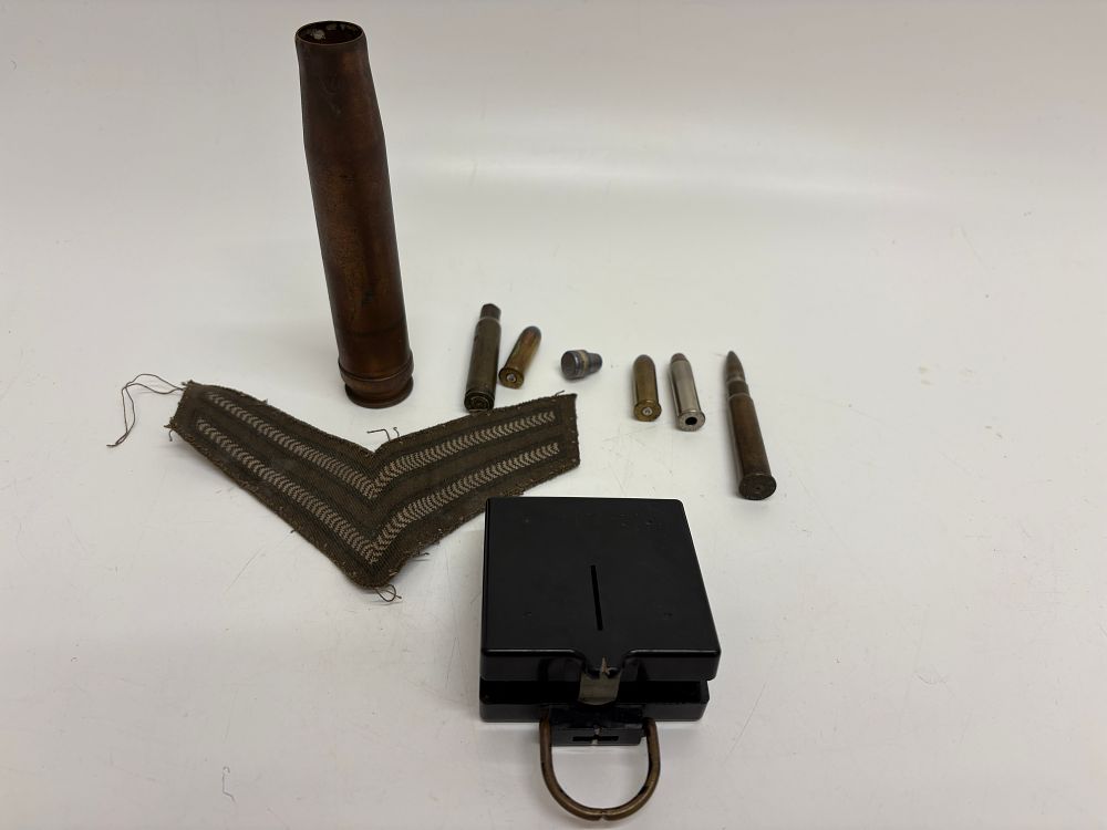 Lot 575: An Assortment of British and Commonwealth WWII Period Militaria Including a T. G. Co Ltd Compass