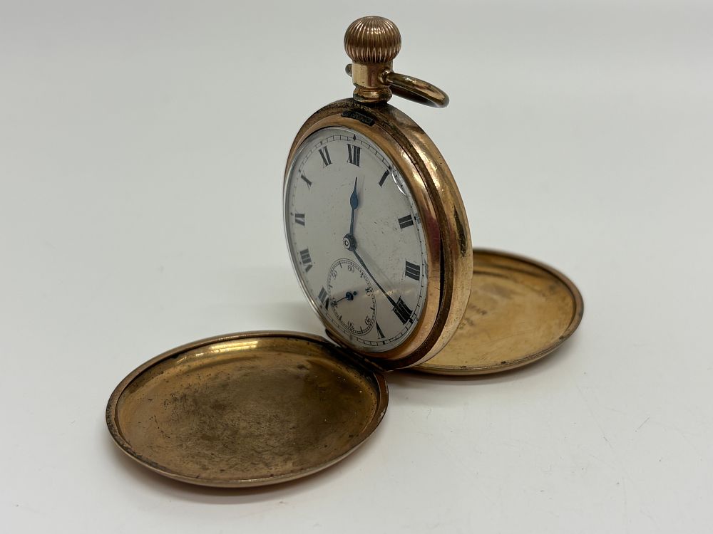 Lot 630: A gold-filled hunter pocket watch by the Dennison Watch Case Co