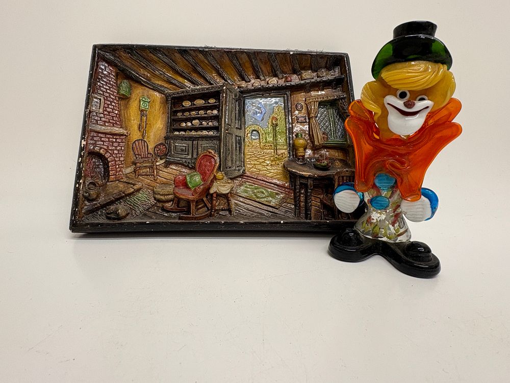 Lot 676: Two Vintage Decorative Items Comprising a Glass Clown Figurine and a Three-Dimensional Relief Cottage Interior Plaque