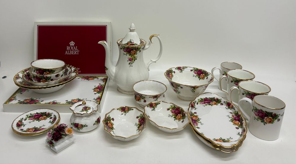 Lot 738: A Collection of Royal Albert Old Country Roses Bone China Tea and Coffee Service with Place Mats
