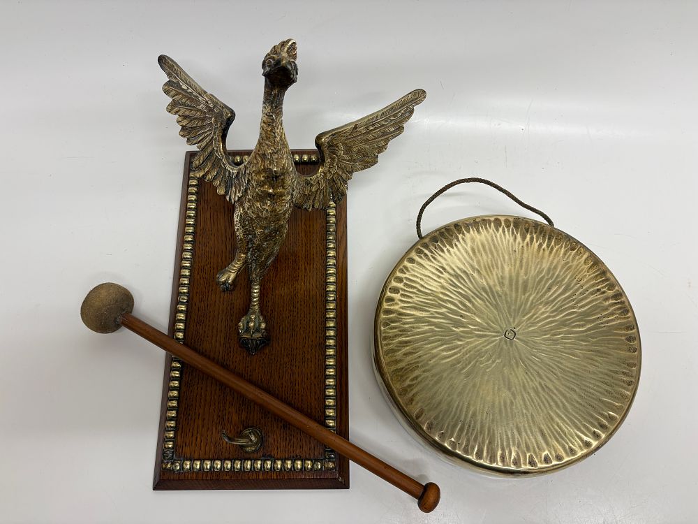 Lot 352: A Table Gong with Cast Brass Winged Pheonix Mount and Oak Base
