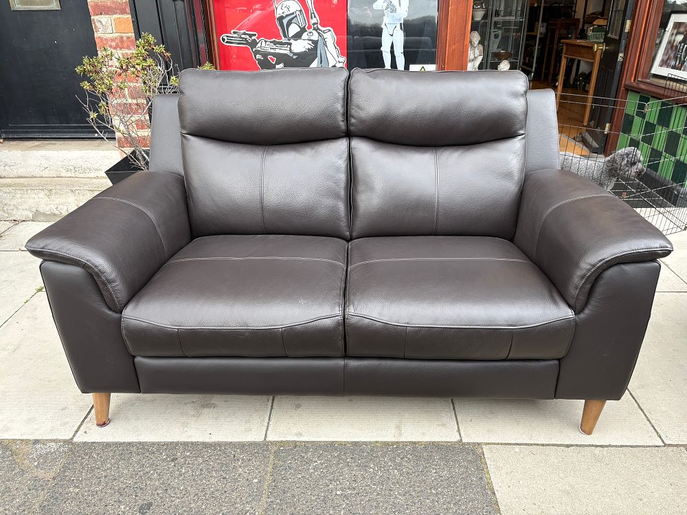 Lot 761: A contemporary dark brown leather two seater