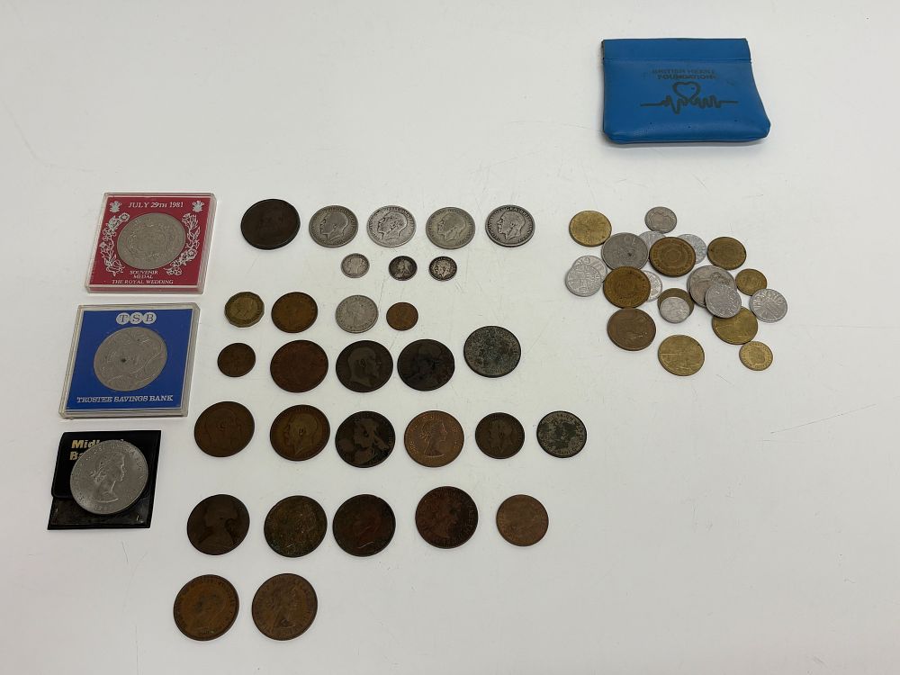Lot 731: A Collection of British and International Coins and Commemorative Medals