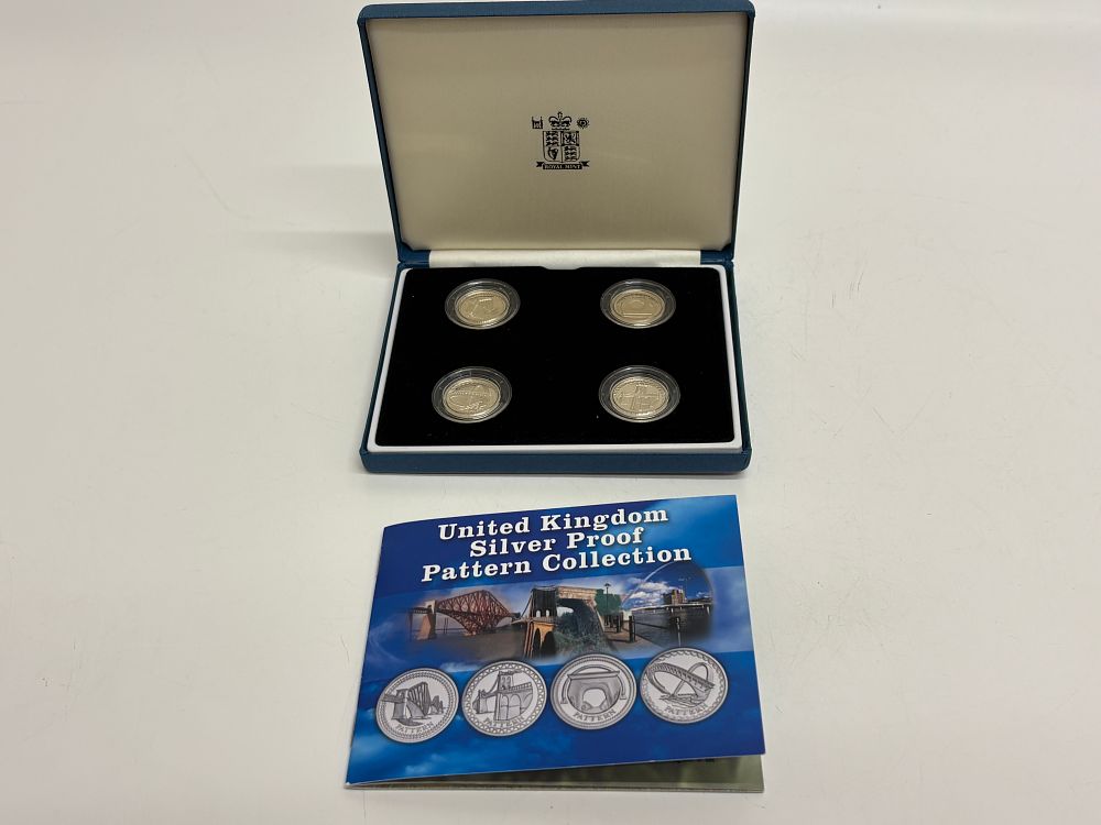 Lot 50i: A Royal Mint UK Silver Proof Pattern Collection of Four Sterling Silver Coins 38g