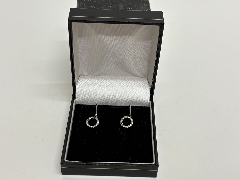 Lot 86: A Pair of 9ct White Gold Pave-Set Circular Drop Earrings Gross circa 1.4g
