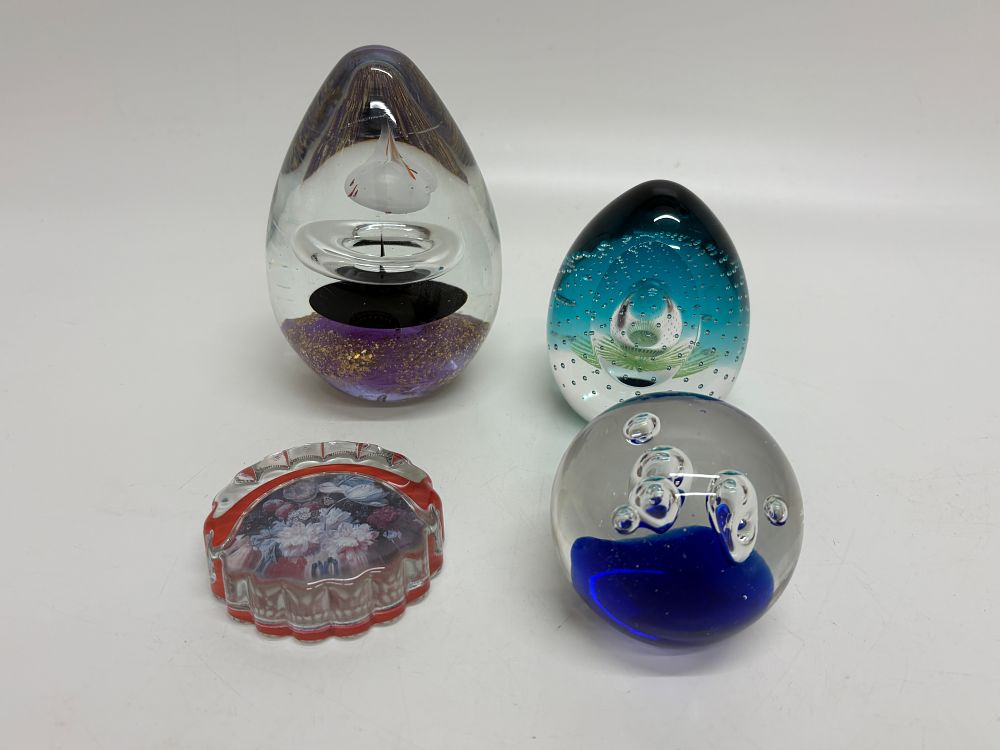 Lot 706: A collection of four decorative art glass objects