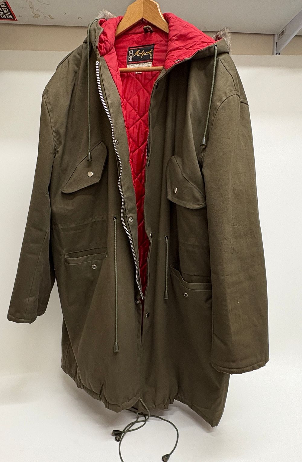Lot 688: A vintage Malport men's fur-trimmed parka coat with red quilted lining