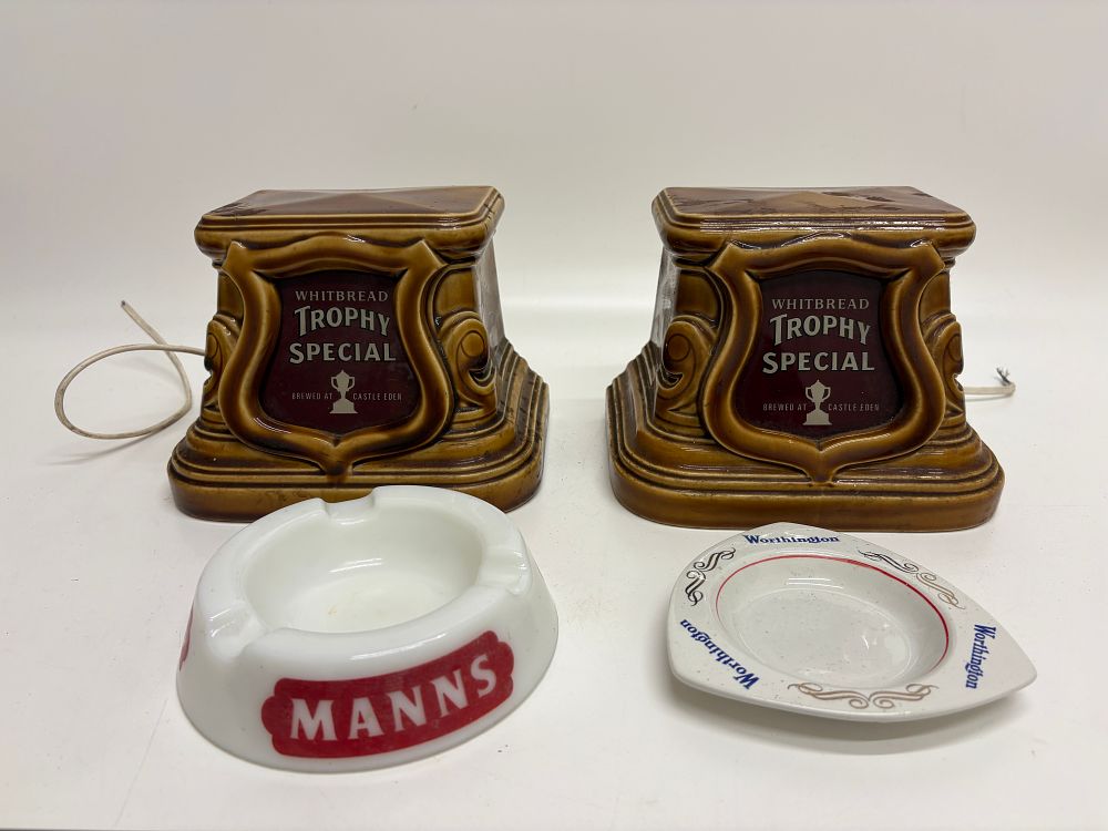 Lot 672: An Assortment of British Breweriana including Whitbread Trophy Special Bar Lights and Advertising Ashtrays