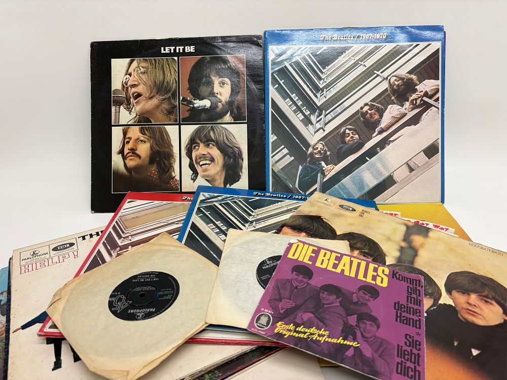 Lot 656: A Collection of Eleven The Beatles Long Play Records and Three 45 RPM Singles