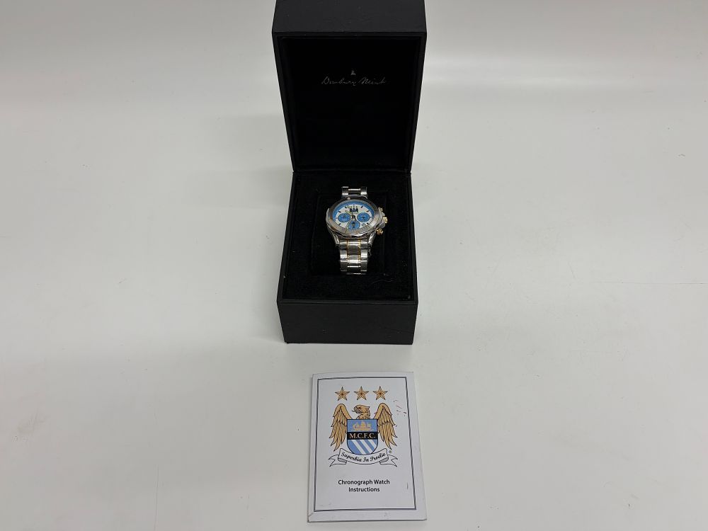 Lot 631: A Danbury Mint Manchester City F.C. 2011-12 Premier League Winners Limited Edition Chronograph Wristwatch