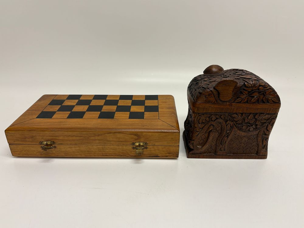Lot 613: A Pair of Wooden Collectibles Comprising a Folding Chess Set and a Carved Cigarette Dispenser