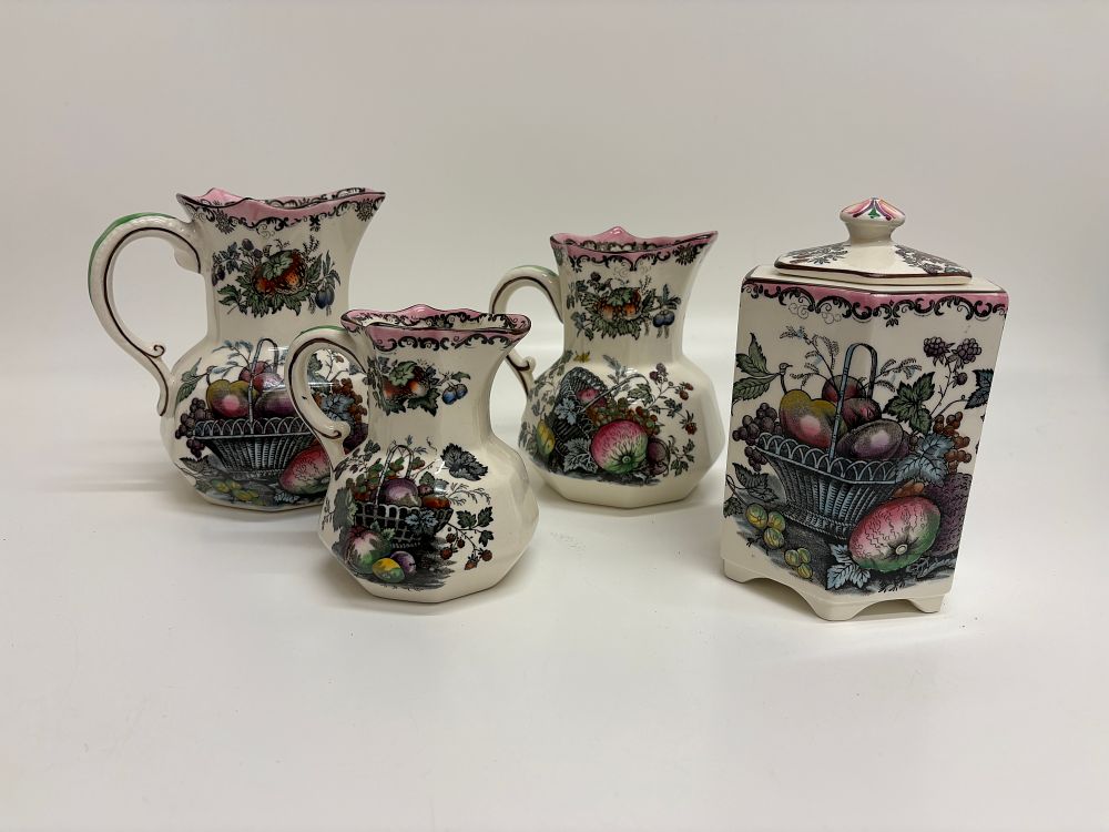 Lot 595: A four-piece group of Masons Ironstone tableware in the Fruit Basket pattern