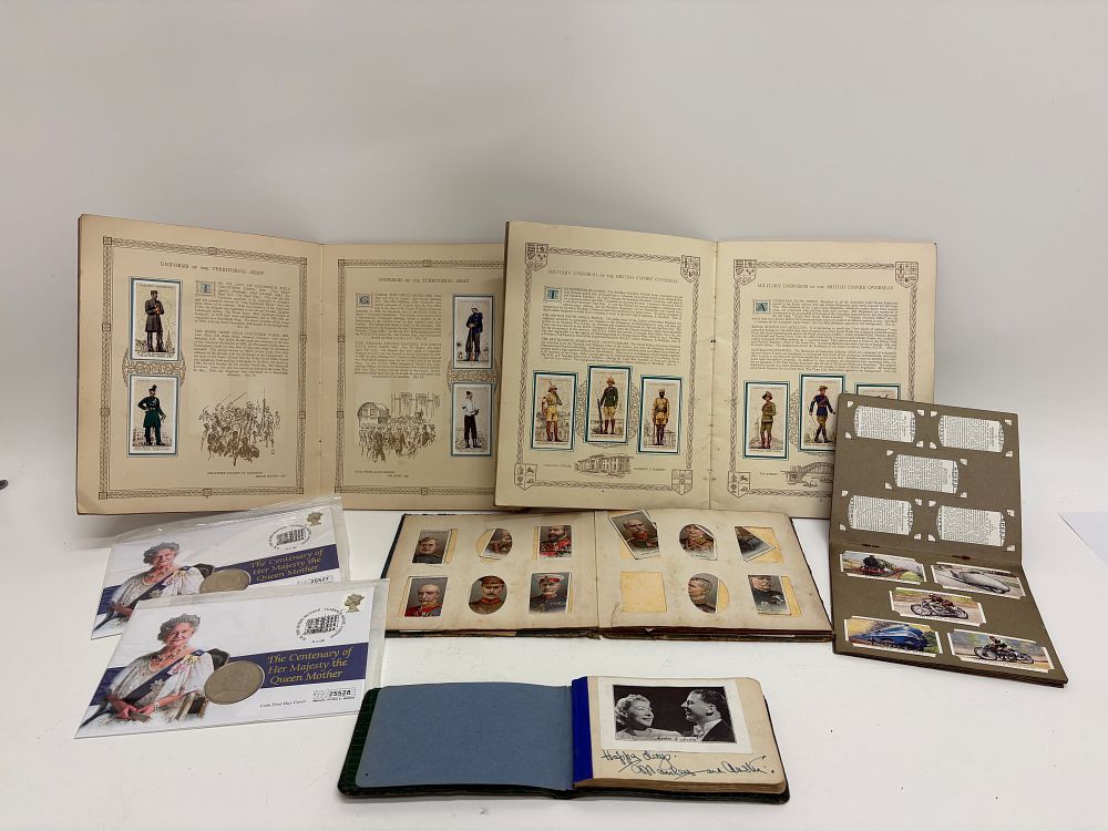Lot 569: A Collection of Vintage Cigarette Card Albums Mid Century Autograph Album and Commemorative Coin Covers