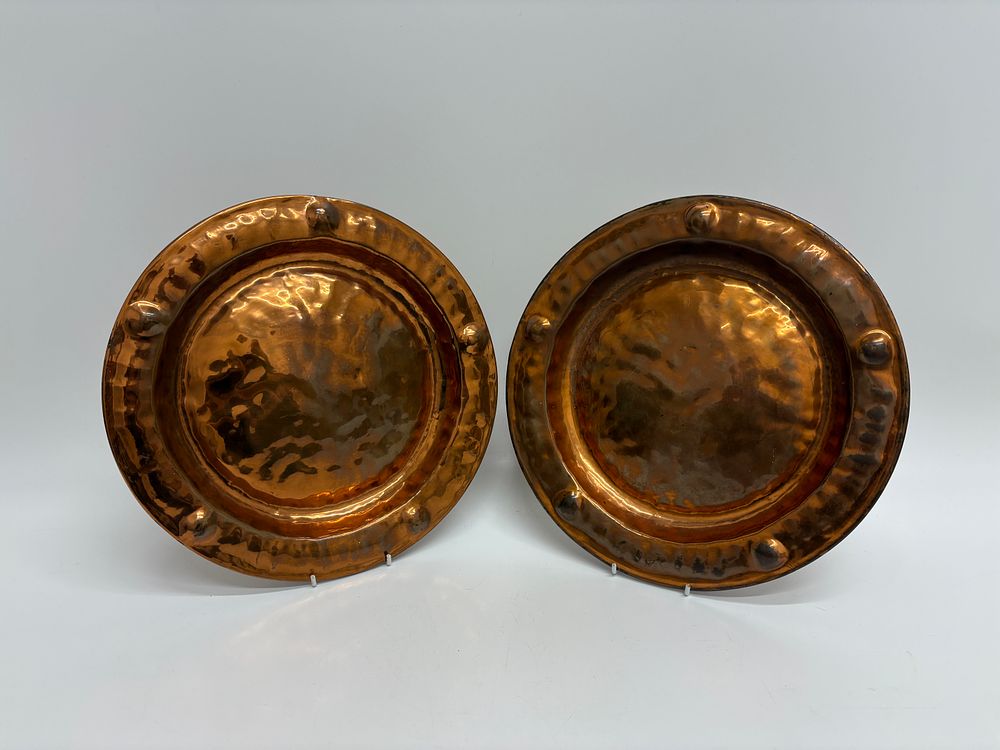 Lot 522: A Pair of Lombard England Arts and Crafts Hammered Copper Chargers