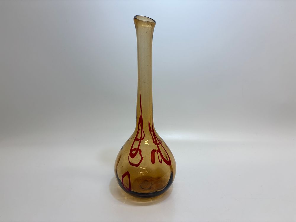 Lot 508: A large hand-blown amber and red glass floor vase with elongated neck 40cm tall