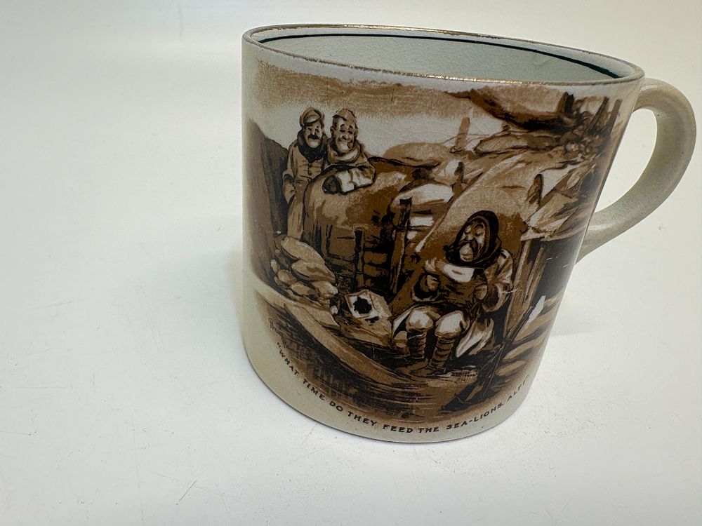 Lot 502: A Grimwades Winton Bruce Bairnsfather earthenware Great War memento mug
