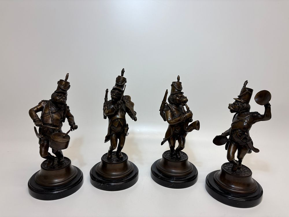 Lot 373: A Set of Four Bronze Military Dog Musicians on Marble Plinths