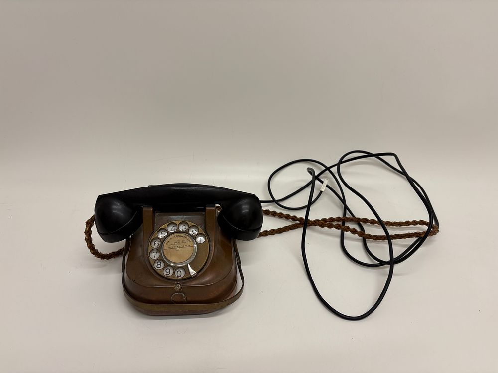 Lot 315: Belgian RTT-56 Copper Toned Metal and Bakelite Rotary Dial Telephone