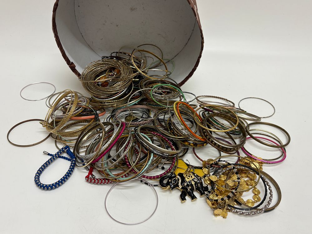 Lot 438: A Collection of Mixed Costume Jewellery Bangles and an Elephant Brooch