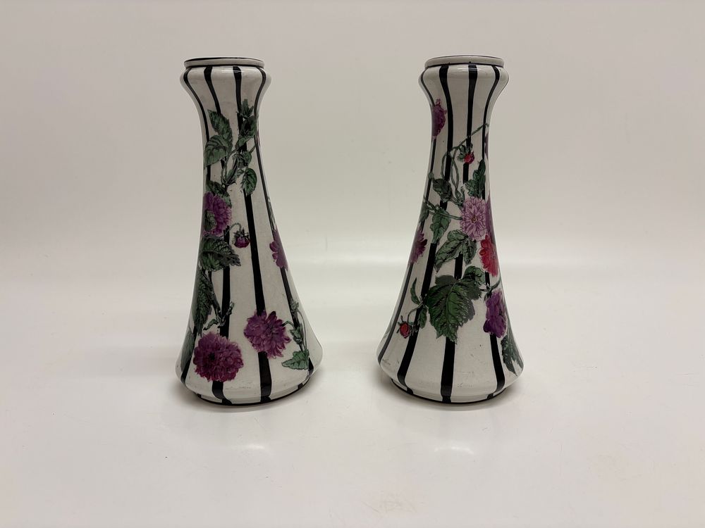 Lot 435: A Pair of George Jones and Sons Crescent Pottery Floral Candlesticks