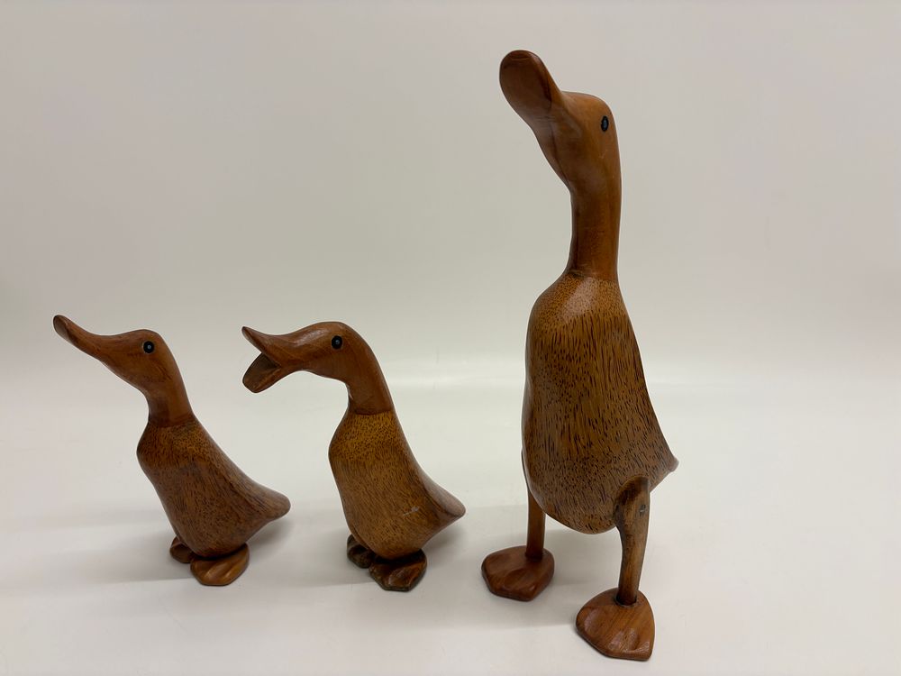 Lot 217: A Trio of DCUK Bamboo Root and Hardwood Duck Figurines