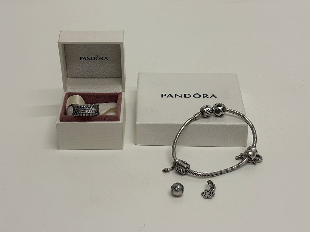 Lot 50: A Collection of Pandora Sterling Silver Jewellery Size L gross circa 32.68g