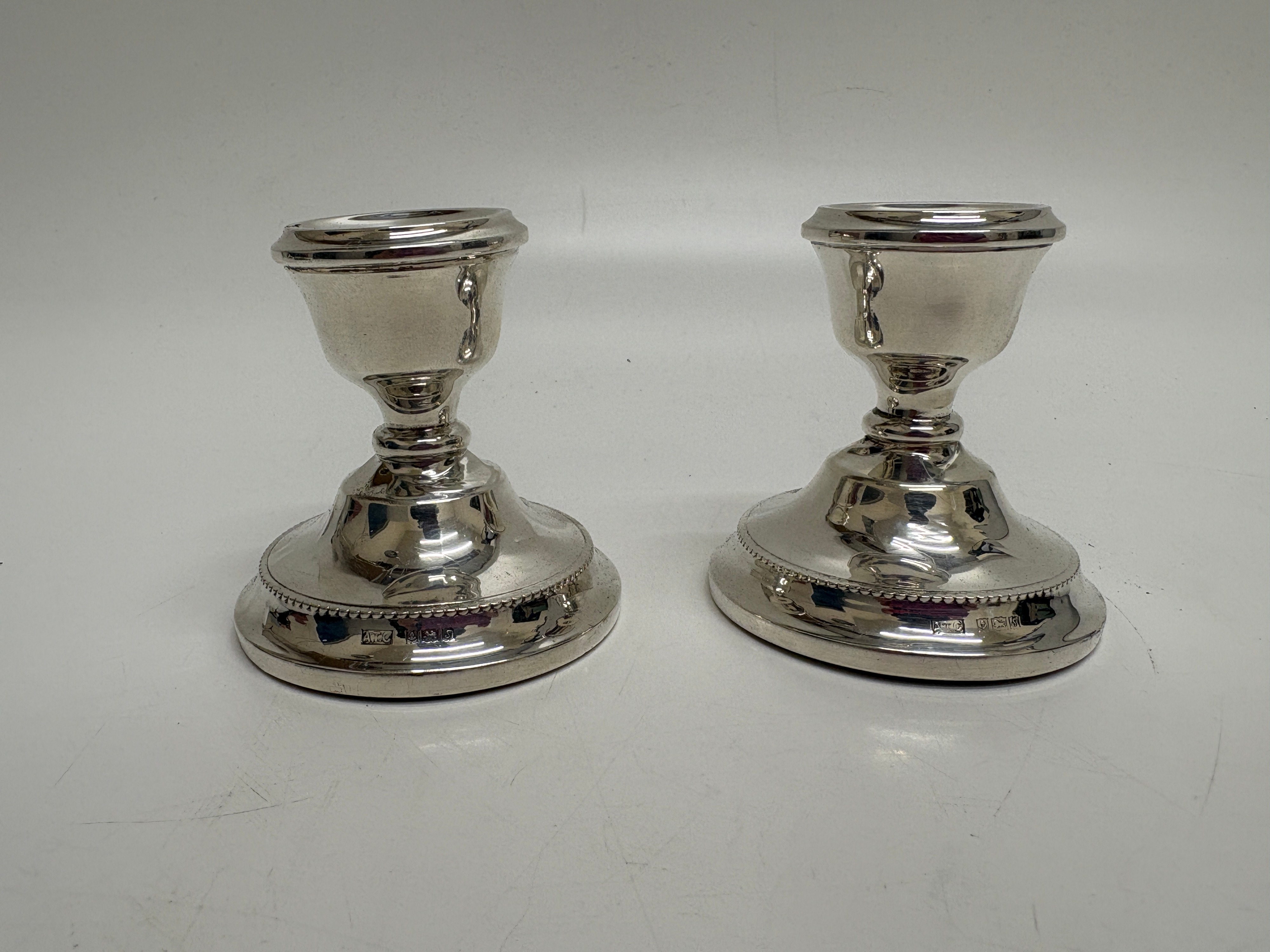 A Pair of Birmingham Sterling Silver (Weight removed)  Candlesticks circ 67.8g net