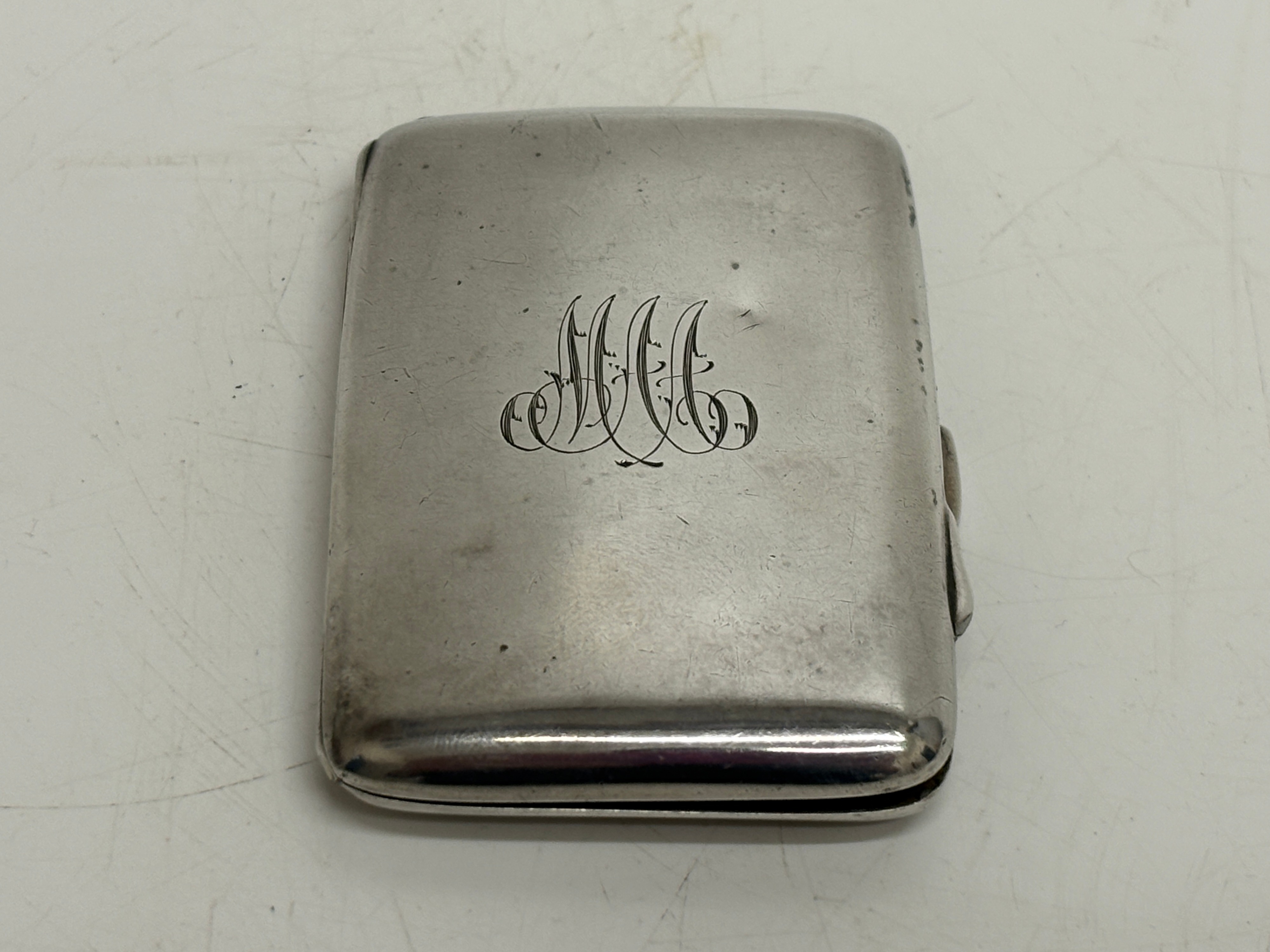 A Sterling Silver Gilt Lined Cigarette Case Birmingham 1919 circa 56g net