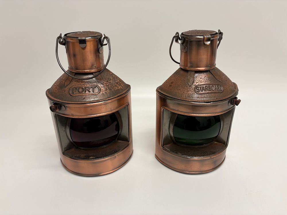 Lot 155: A Pair of Nautical Copper and Brass Port and Starboard Navigation Lanterns