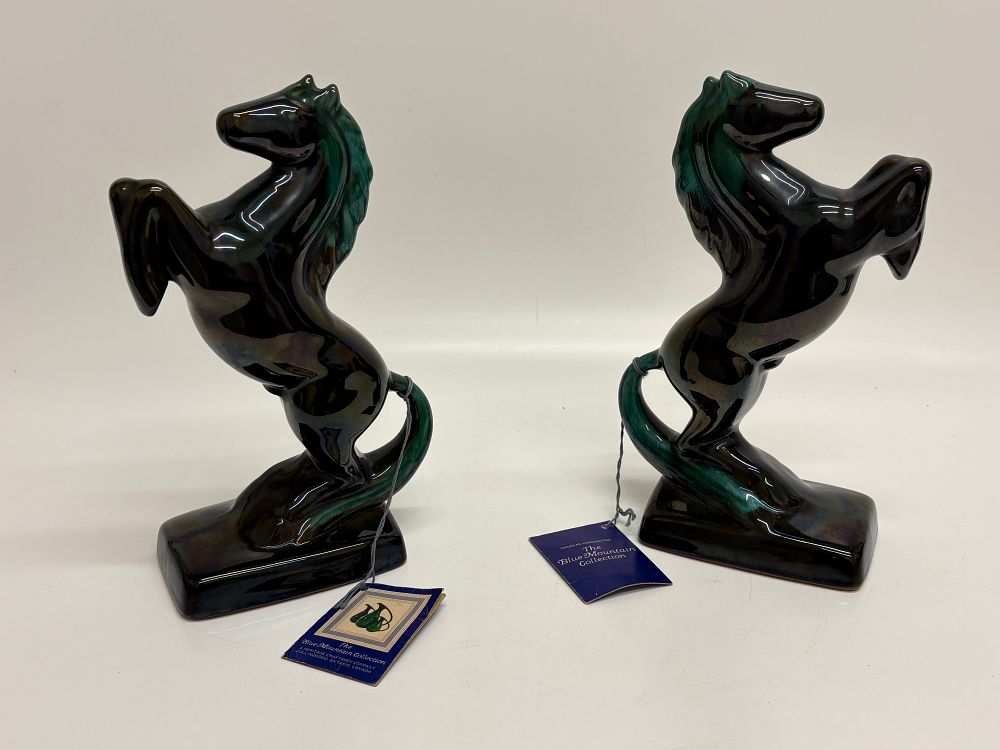 Lot 356: A Pair of Blue Mountain Pottery Rearing Horse Figurines